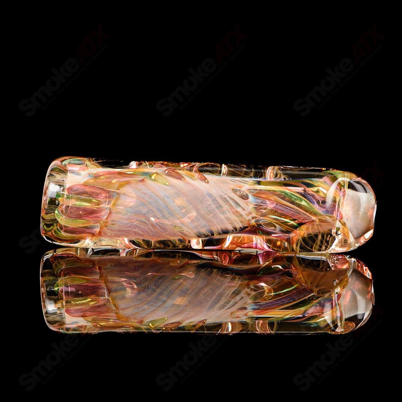 Texas Hot Glass #35 Taster Chillum glass with colorful design, featuring a compact, hand-held smoking pipe for discreet use.