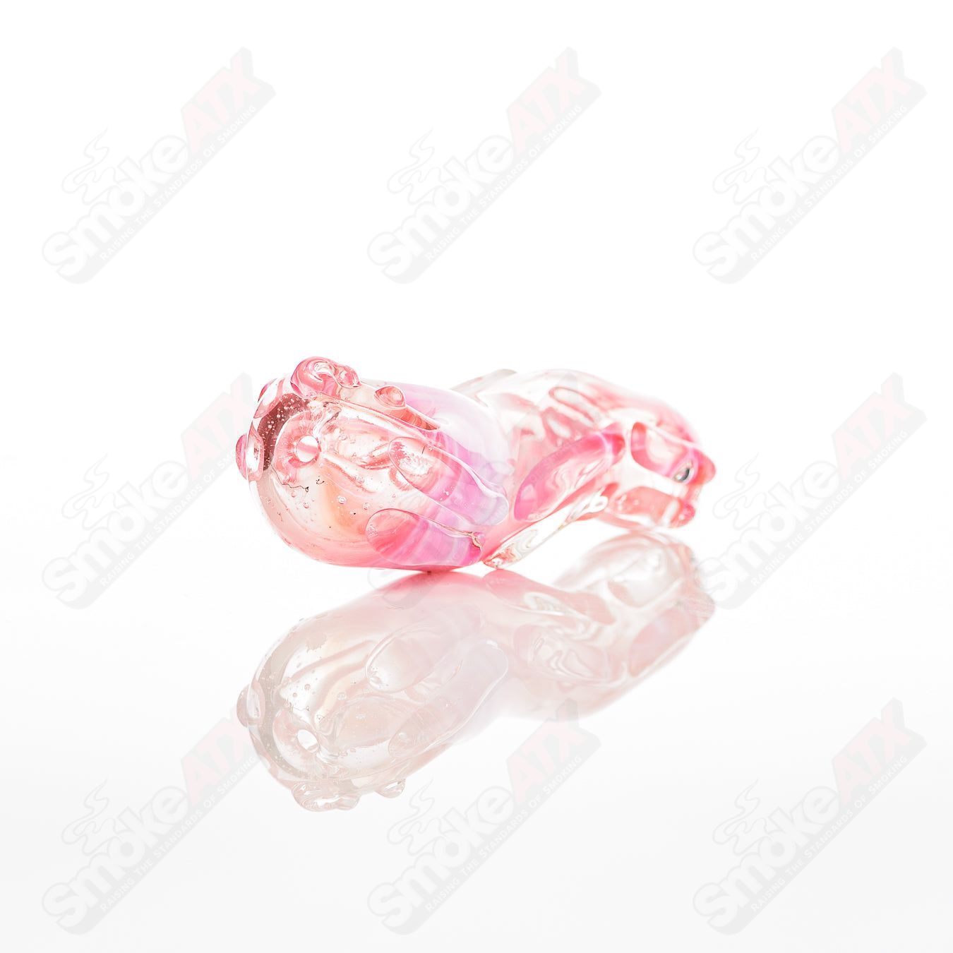 Glass pipe called Spoon Glass by Nobody, featuring a clear glass design with a rounded bowl and smooth mouthpiece.