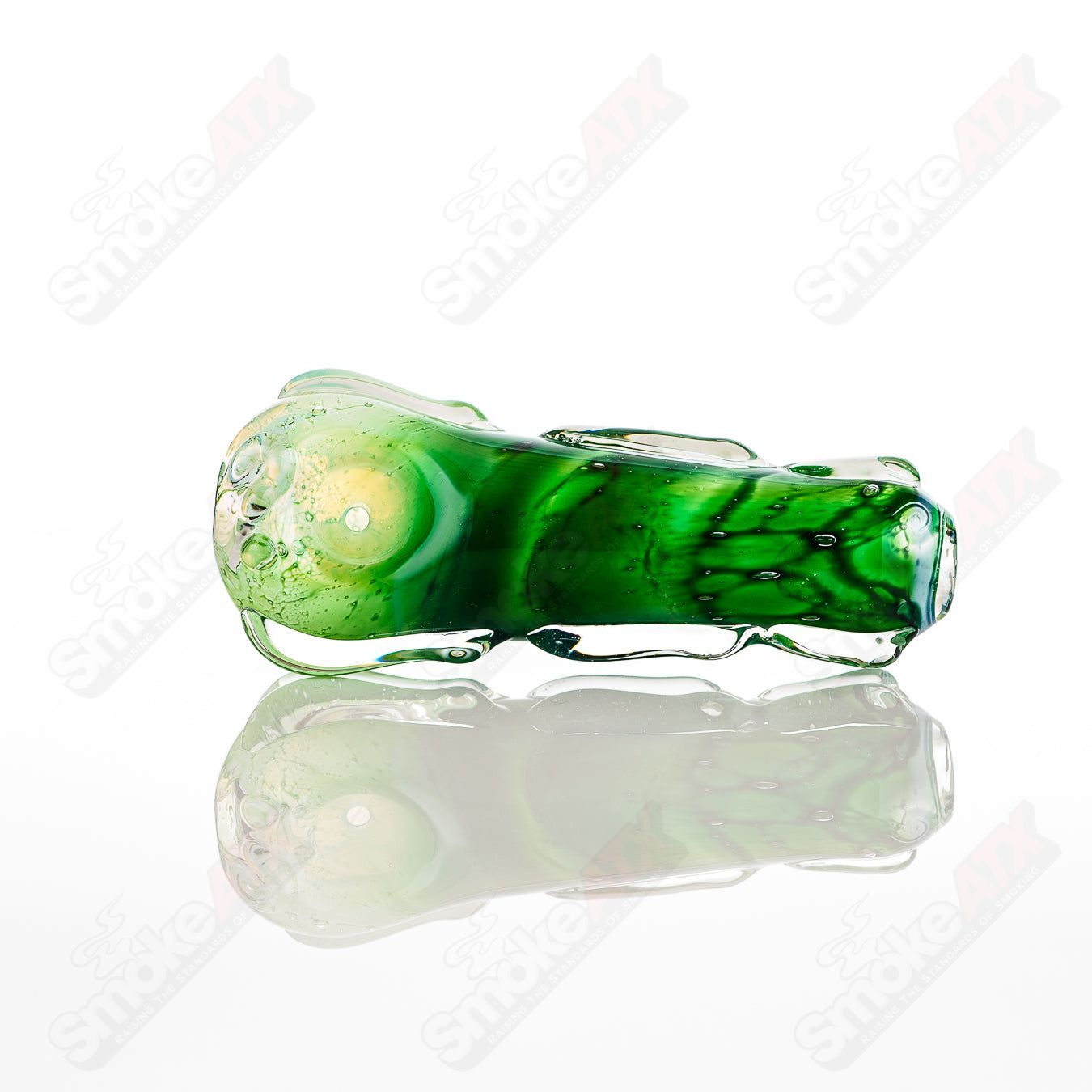Clear glass spoon pipe by Nobody, featuring a smooth, rounded bowl and a sturdy glass stem for smoking or herbal use.