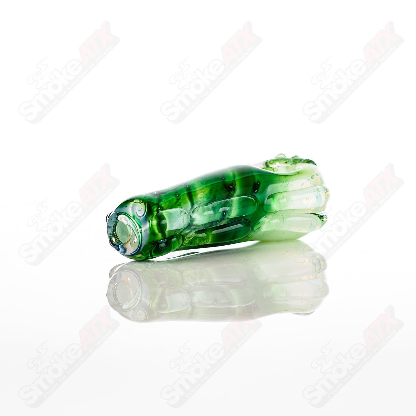 Glass pipe in the shape of a spoon with a clear glass design by Nobody's Glass collection, featuring a smooth, rounded bowl.