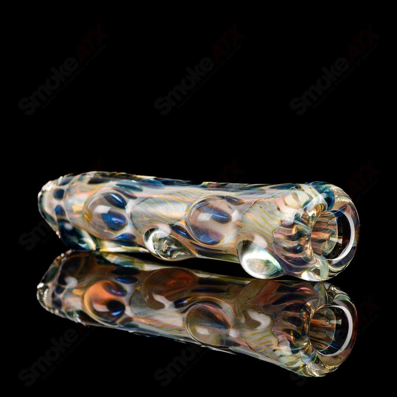 Texas Hot Glass Taster Texas Hot Glass chillum glass pipe with a clear, compact design and smooth finish.
