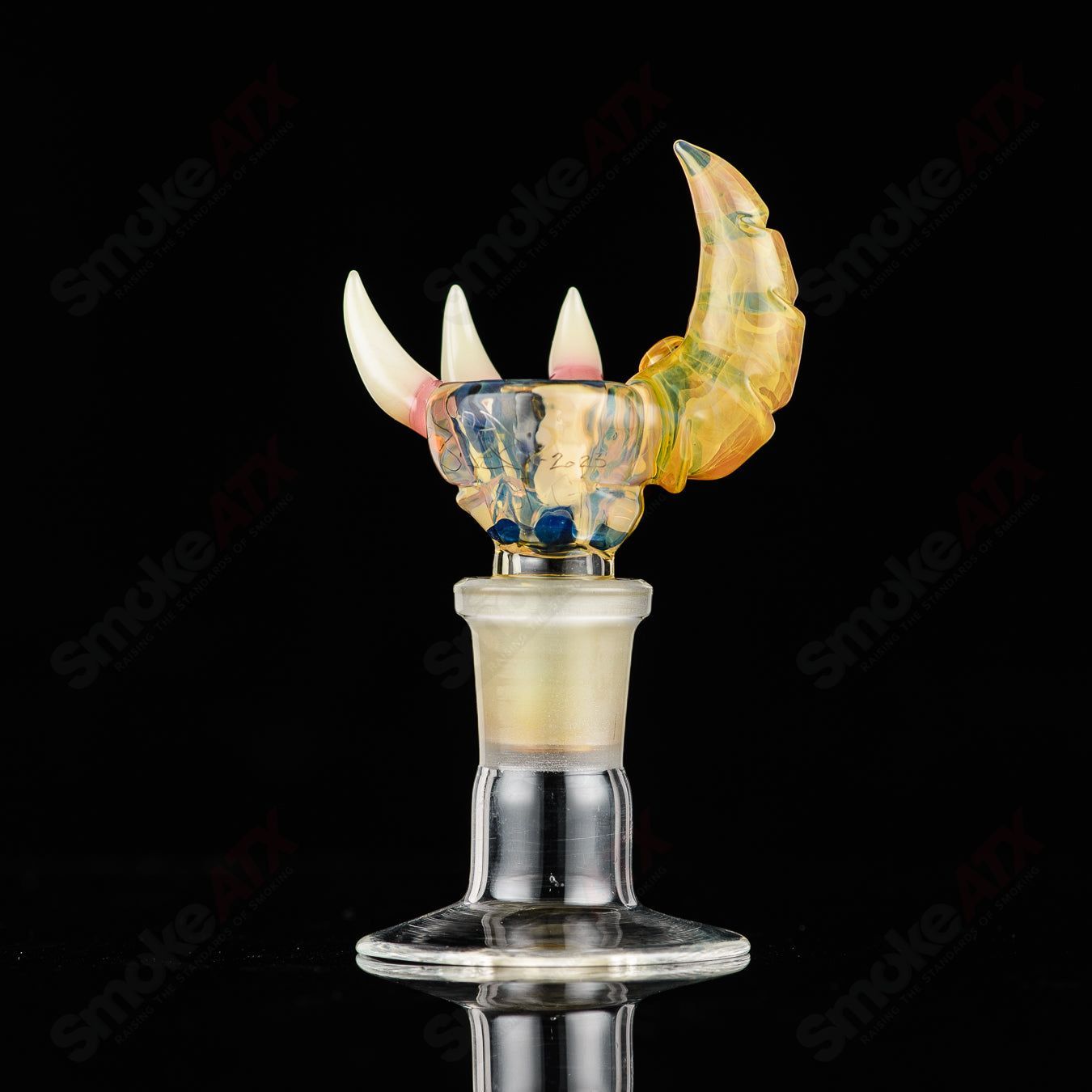 Salt Glass 19mm 3-hole slide for SPG x SALT Heady Glass bowls, shown in a close-up of the glass slide with detailed holes.