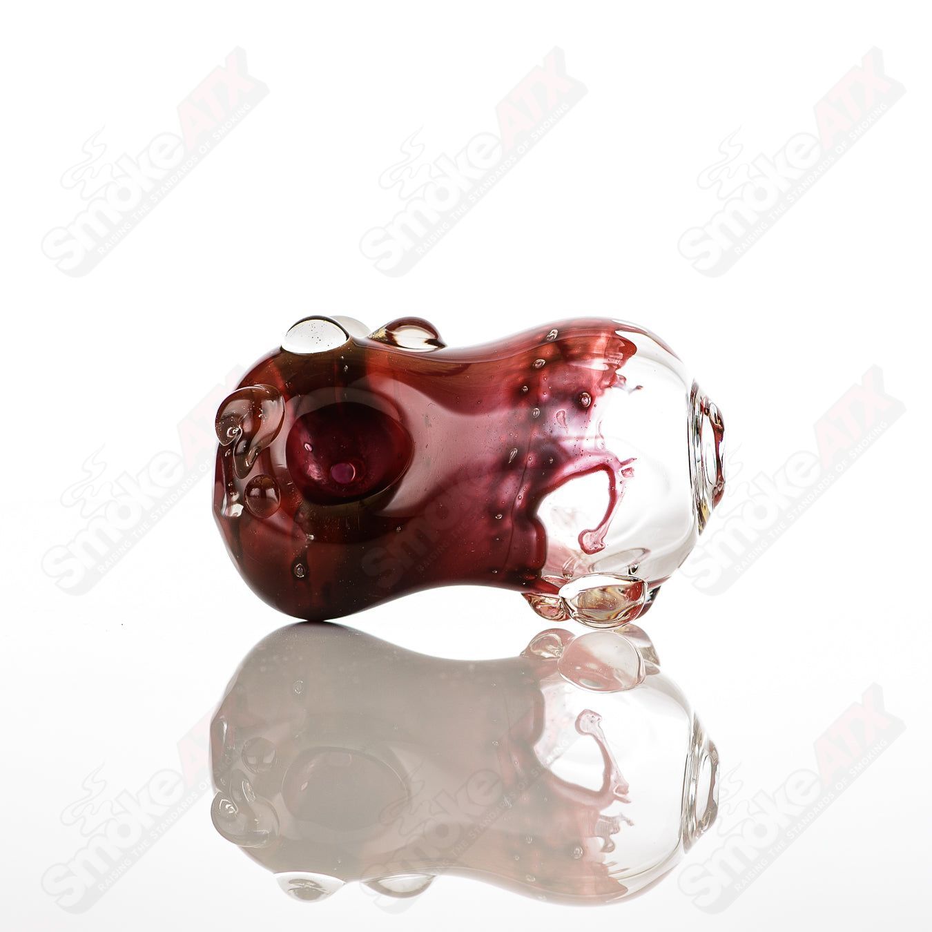 Glass pipe called the #4 Bean Spoon by Nobody, featuring a clear glass design with a bean-shaped bowl and smooth mouthpiece.