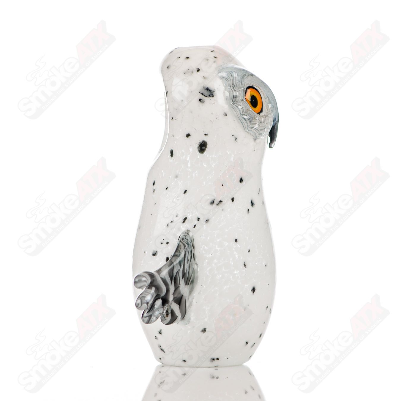 Glass pipe with four-hooter design by Four Winds Flameworks, featuring intricate multicolored glasswork and a clear mouthpiece.