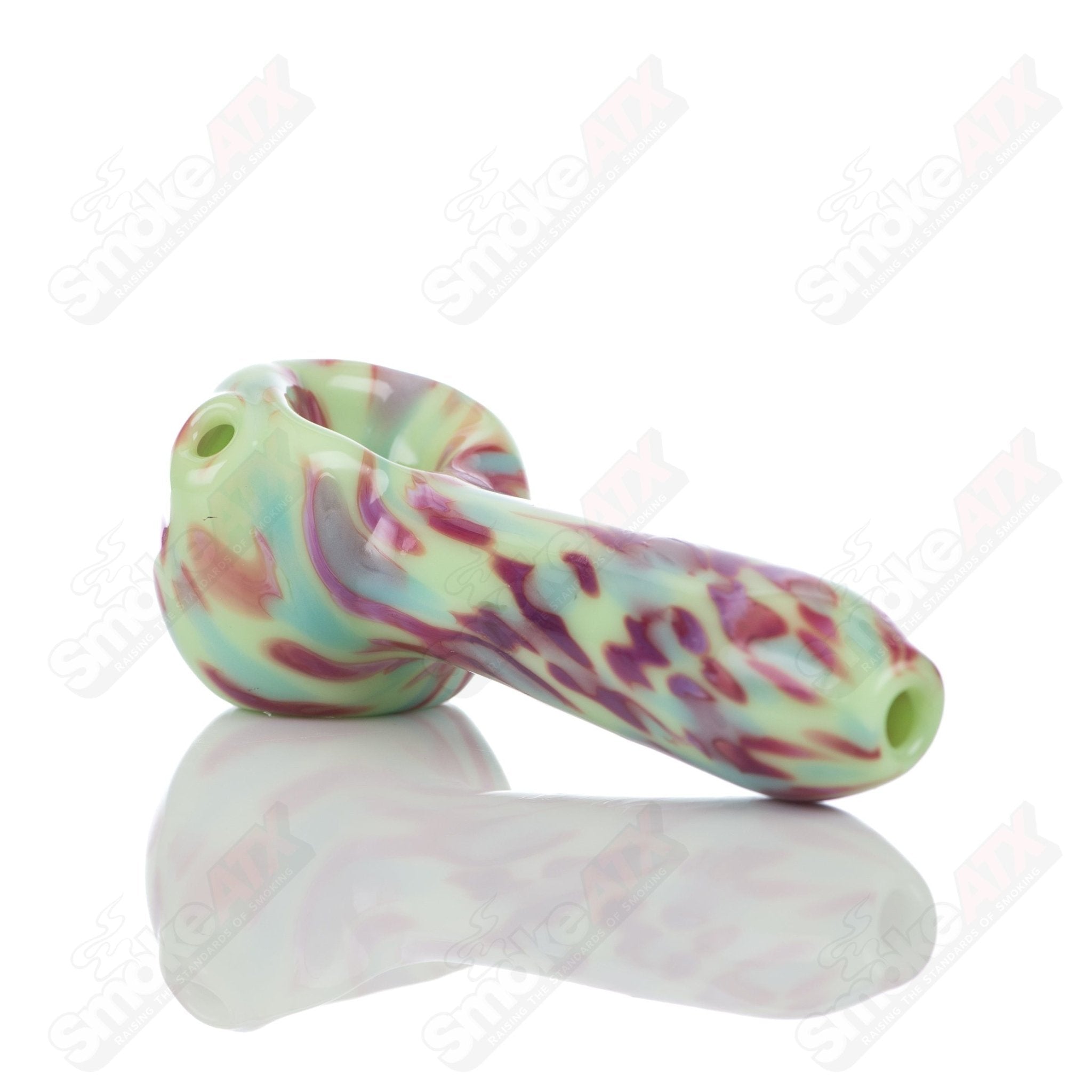 Colorful kiwi splatter glass spoon pipe by Adventures In Glass Blowing, showcasing intricate blown glass design and smooth bowl shape.