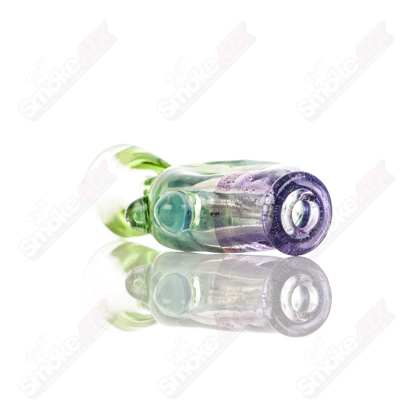 Large glass donut chillum by Baby Dabs, designed for baby dabs, featuring a colorful donut shape and smooth glass finish.