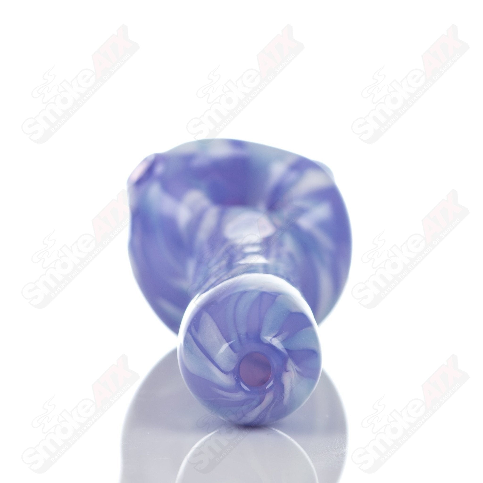 Purple splatter glass spoon pipe by Adventures In Glass Blowing, featuring a colorful design and smooth rounded bowl.