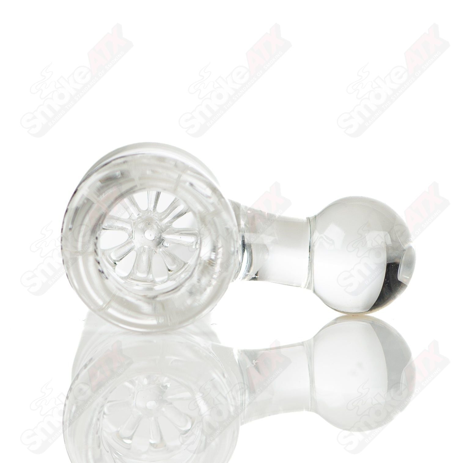 Leisure Glass Rasta 44 Mag bubbler with colorful Rasta design, clear glass body, and functional mouthpiece for smooth smoking.