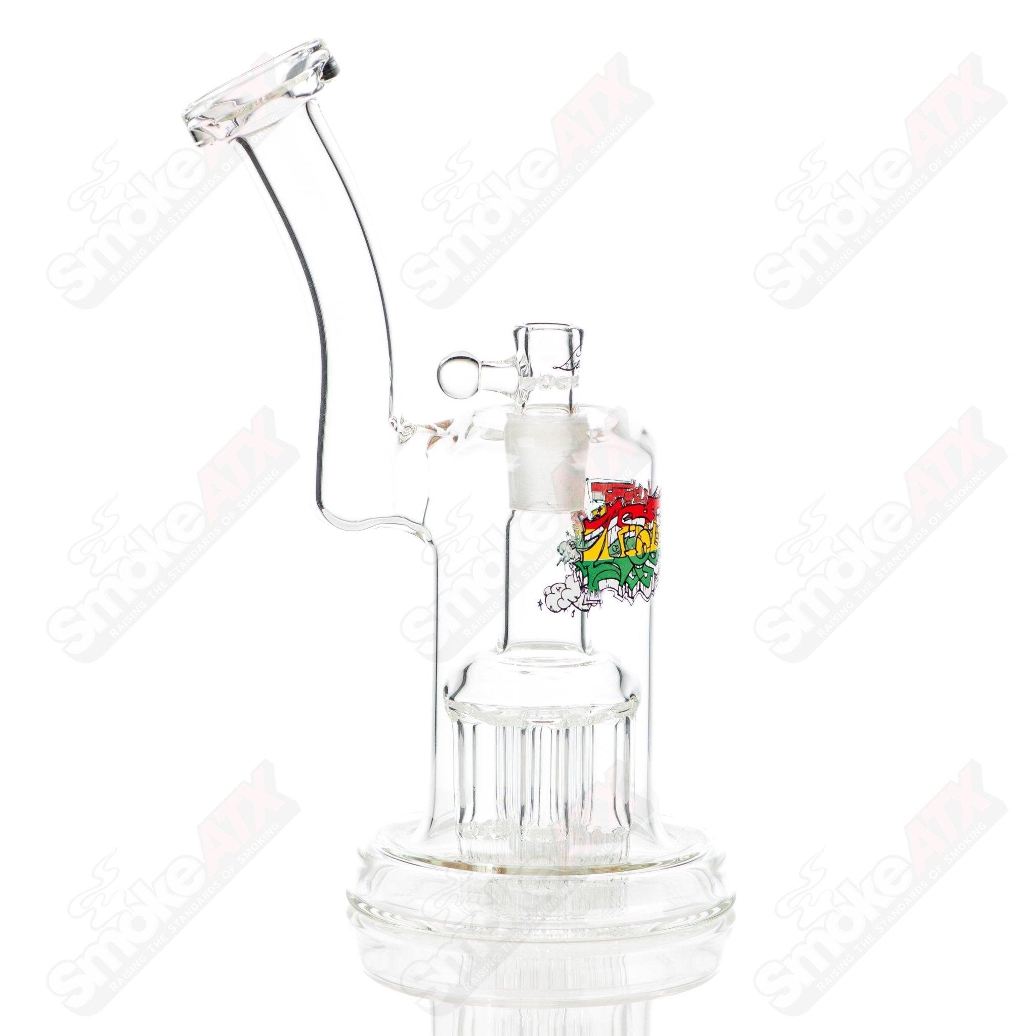 Leisure Glass Rasta 44 Mag bubbler with colorful Rasta design and clear glass body, showcasing intricate glasswork and a sturdy base.