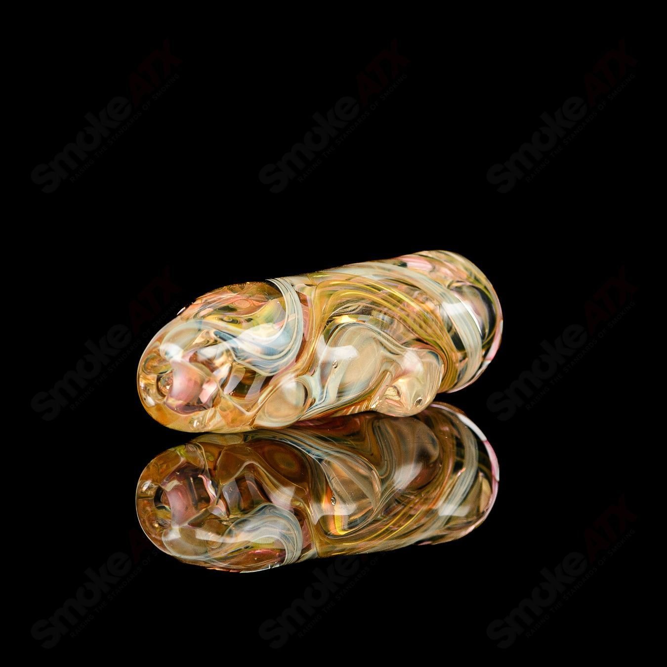 Clear Texas Hot Glass #4 Taster chillum pipe with intricate design, showcasing smooth glass craftsmanship and compact size.