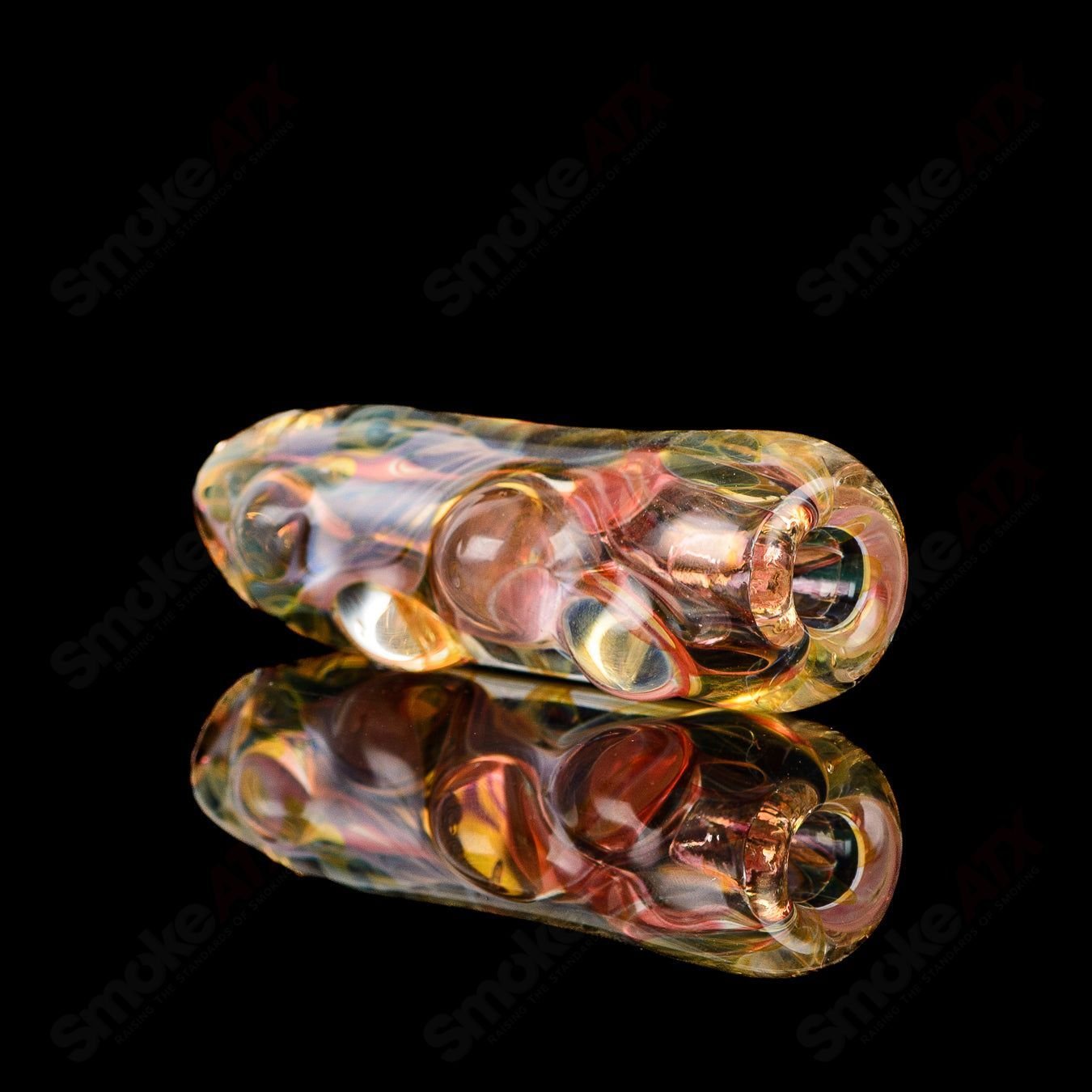 Clear glass Texas Hot Glass #40 Taster Chillum with smooth, cylindrical shape for enjoying herbal or tobacco use.