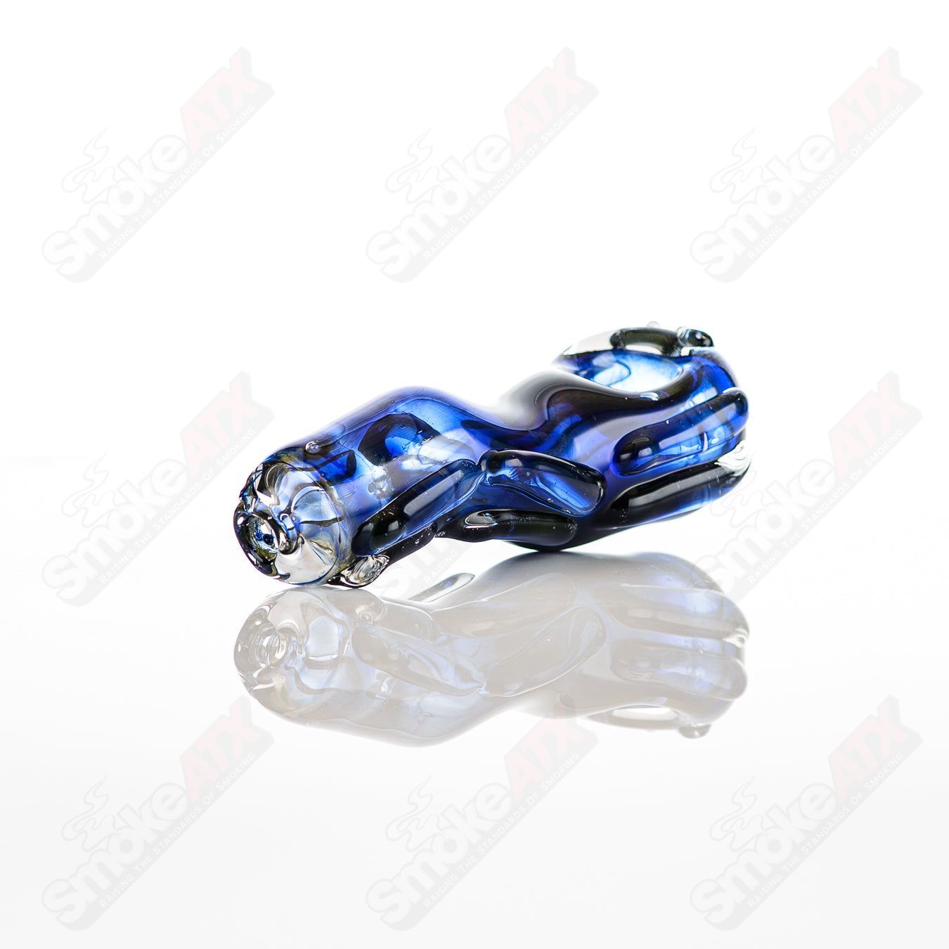 Glass pipe, Spoon Glass by Nobody, clear glass with a smooth, rounded bowl and long stem for smoking or vaporizing.