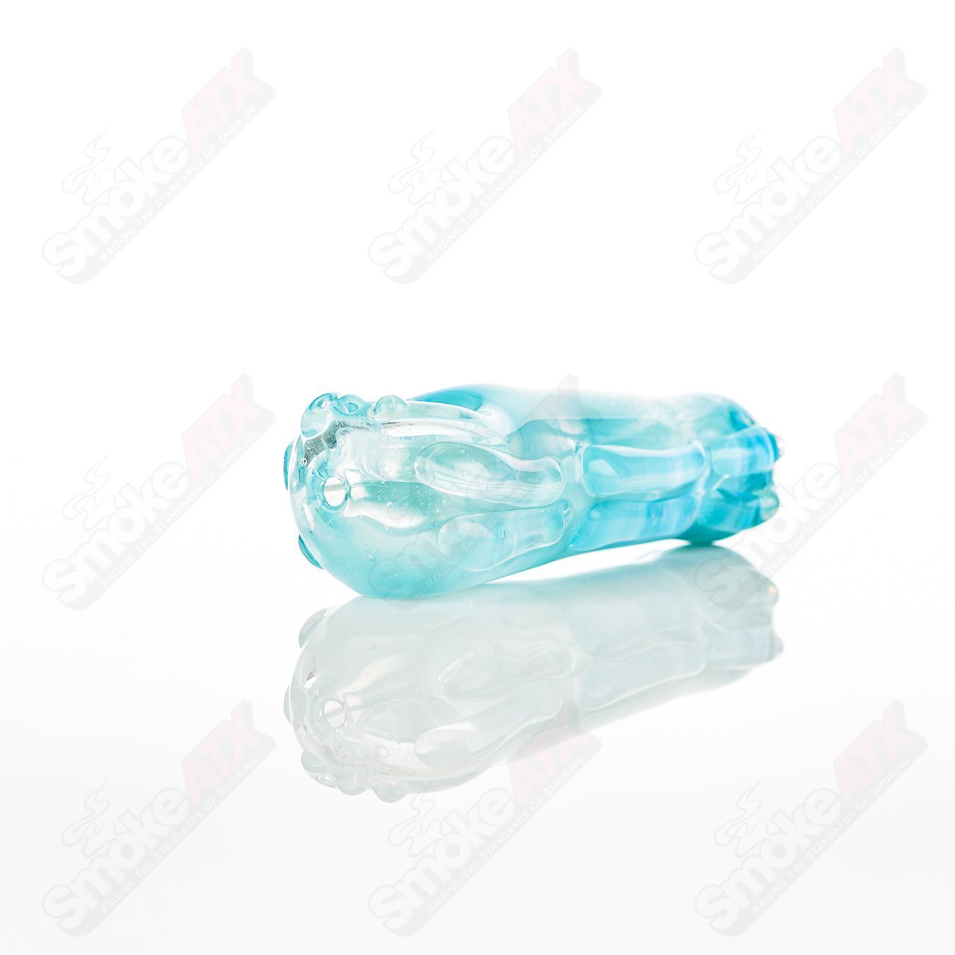 Glass pipe called #46 Spoon Glass by Nobody, featuring a clear glass design with a rounded bowl and smooth mouthpiece.