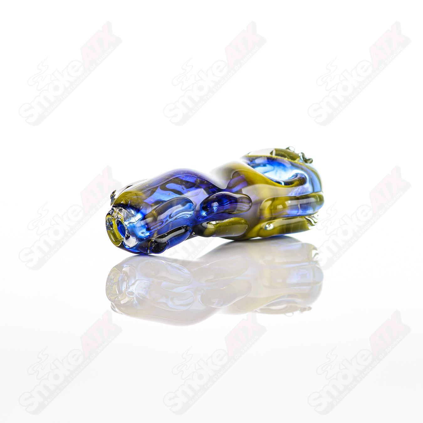 Clear glass spoon pipe by Nobody with a smooth, rounded bowl and ergonomic design, perfect for smoking sessions.