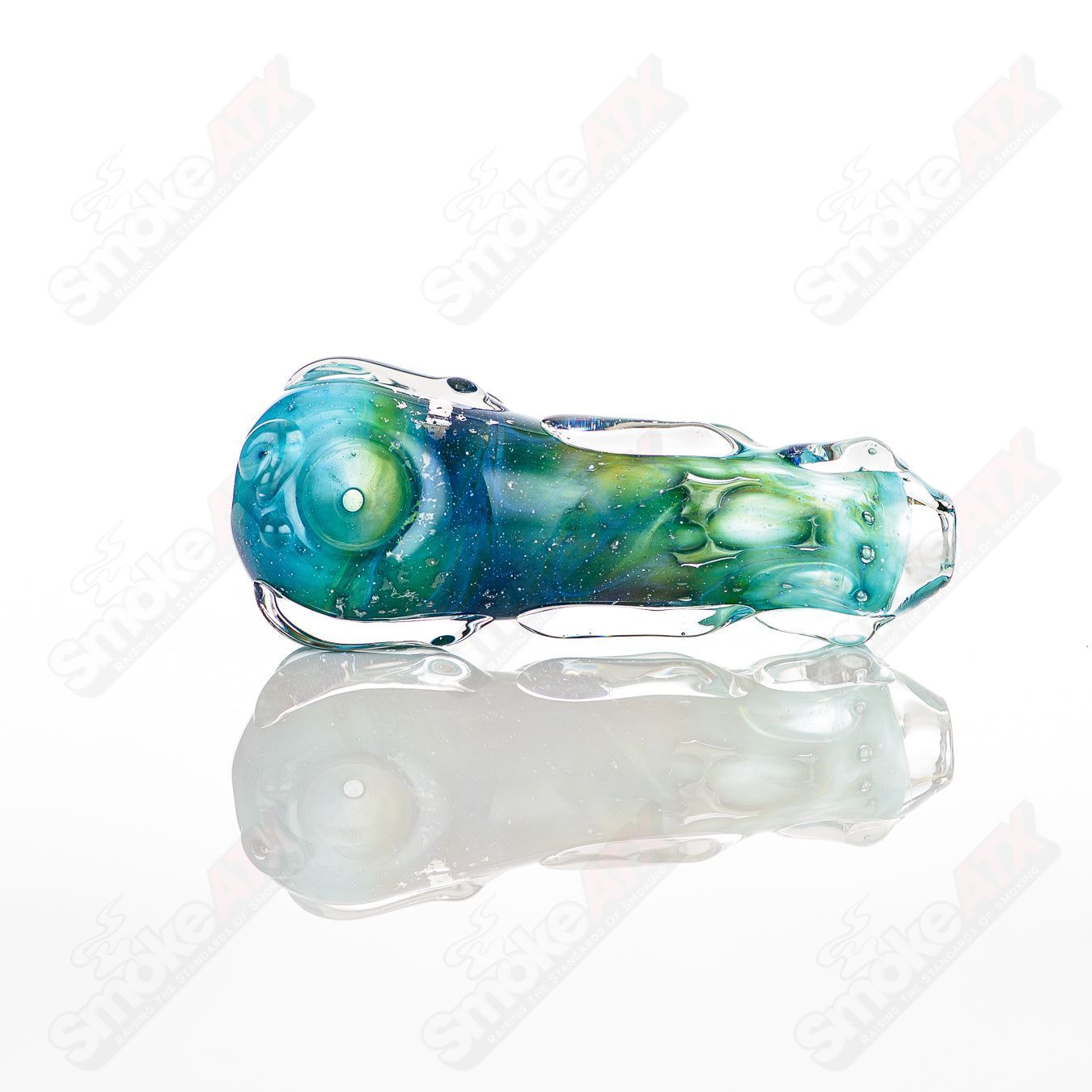 Spoon-shaped glass pipe by Nobody, featuring clear glass with a smooth bowl and ergonomic design for easy handling.