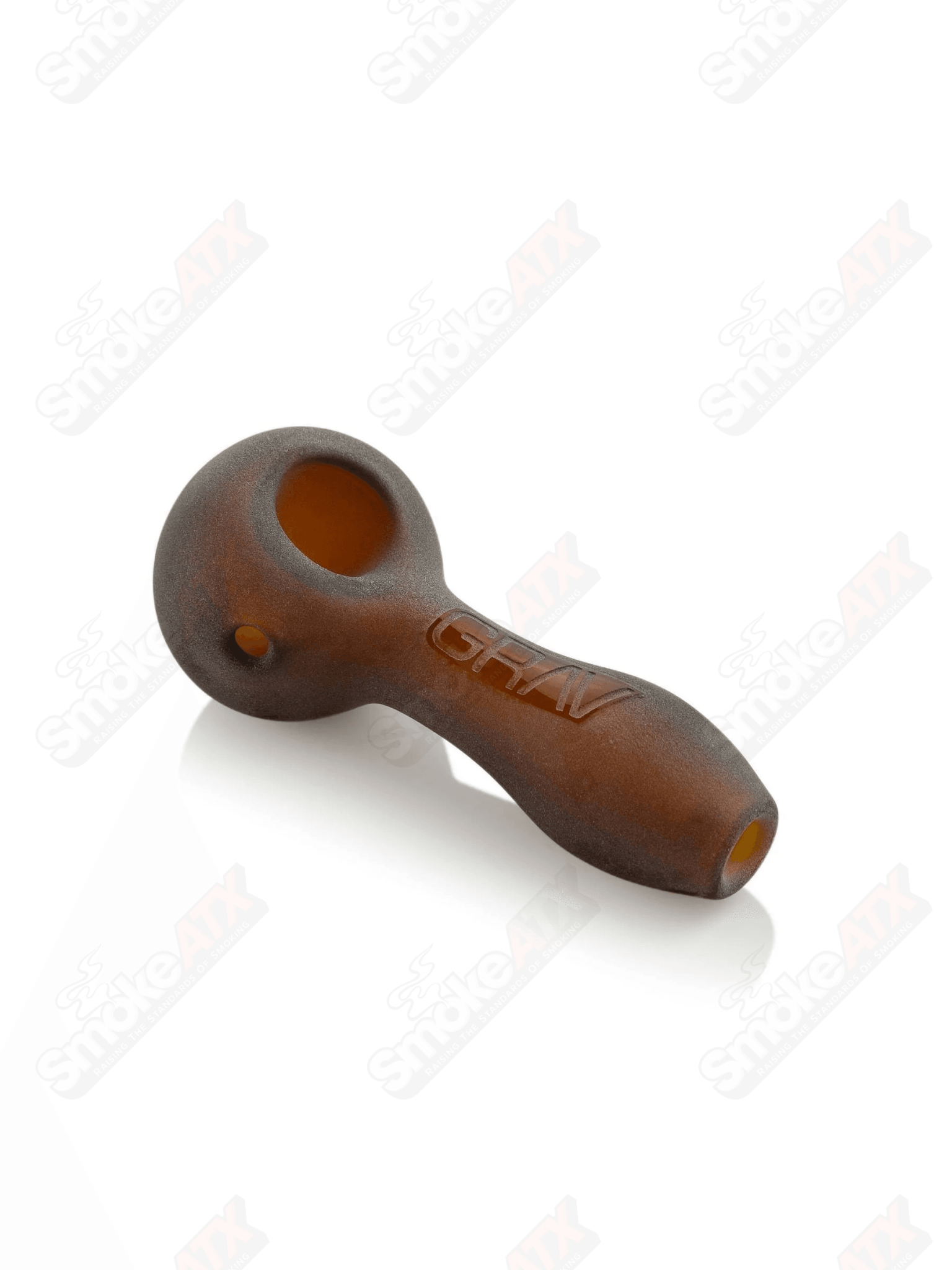 4-inch amber sandblasted glass spoon pipe by Grav Labs with frosted design and smooth rounded bowl.