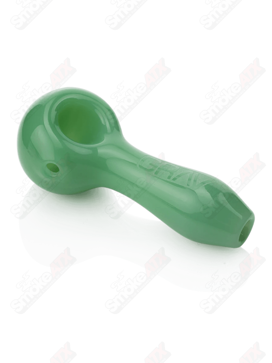 4-inch mint green glass classic spoon pipe by Grav Labs, featuring a smooth rounded bowl and clear glass accents.