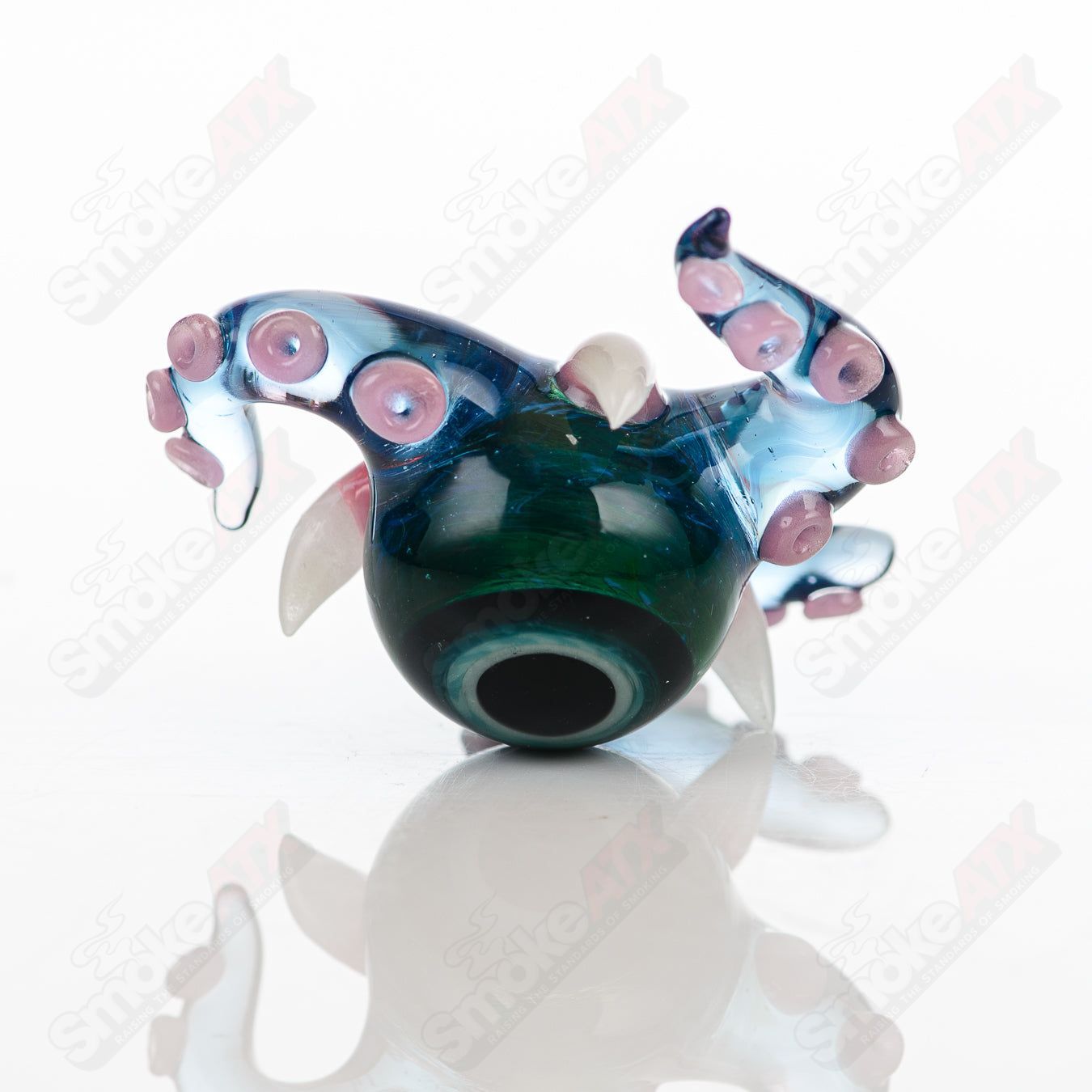 Four-piece Salt Glass Slurper Set featuring Neptune, Plantphibian, and Marina designs, made of clear heady glass.