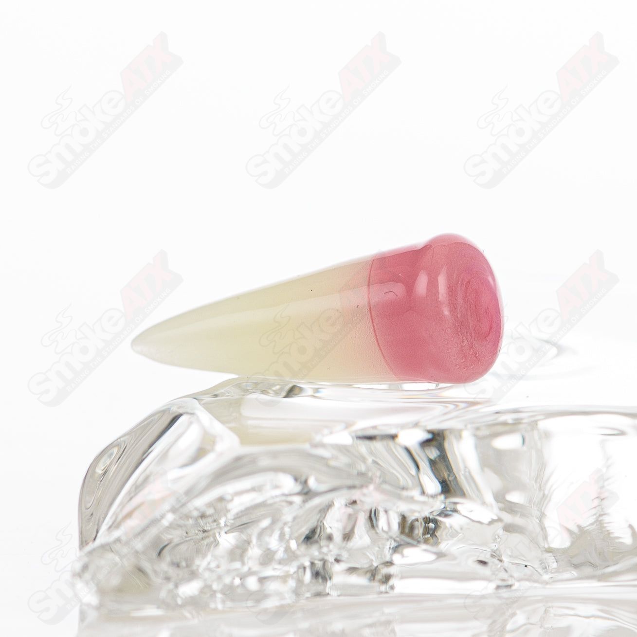 Four-piece Salt Glass Slurper Set featuring Neptune, Plantphibian, and Marina designs, made of clear heady glass.