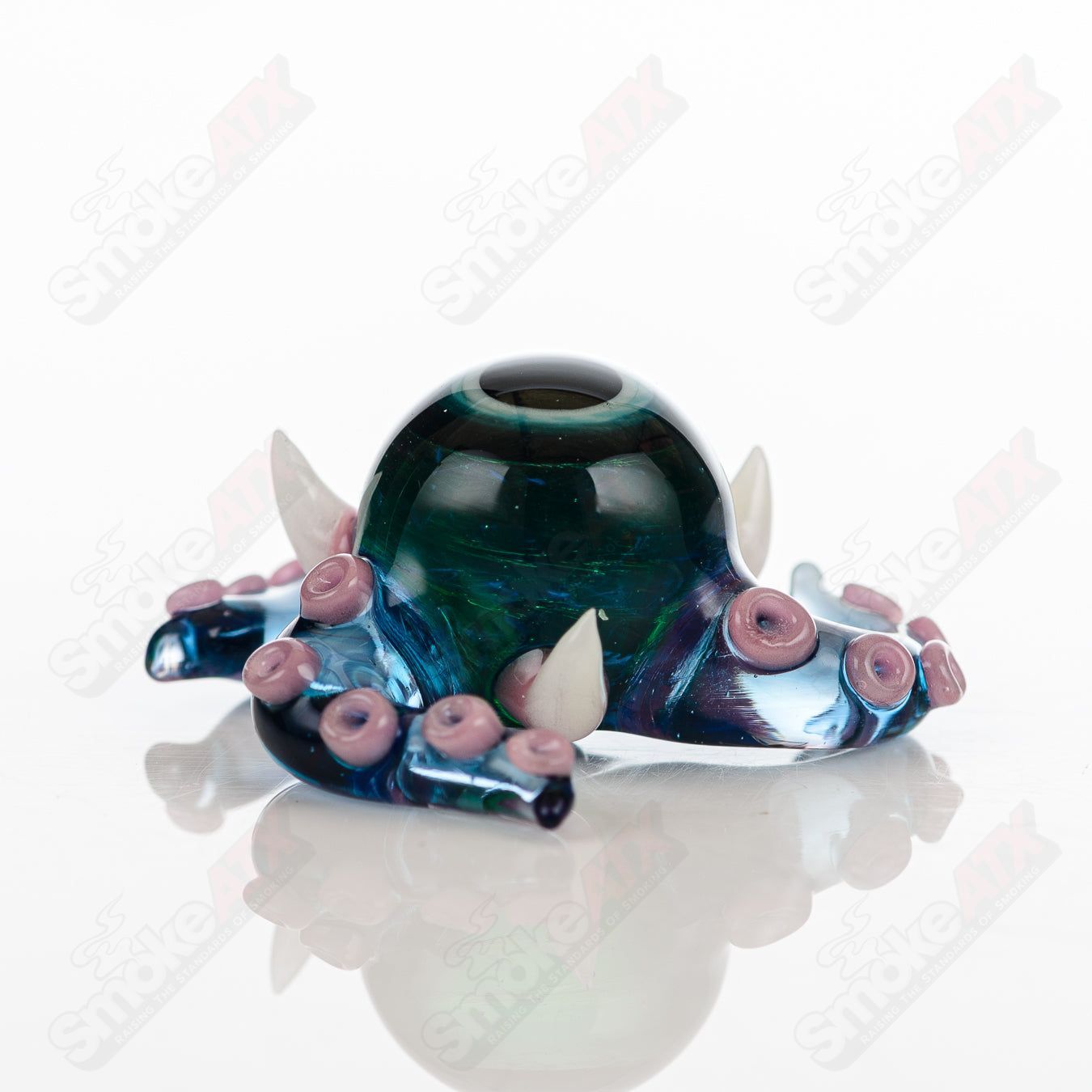 Set of four Salt Glass Slurper pieces featuring Neptune, Plantphibian, and Marina designs, crafted with clear, heady glass.