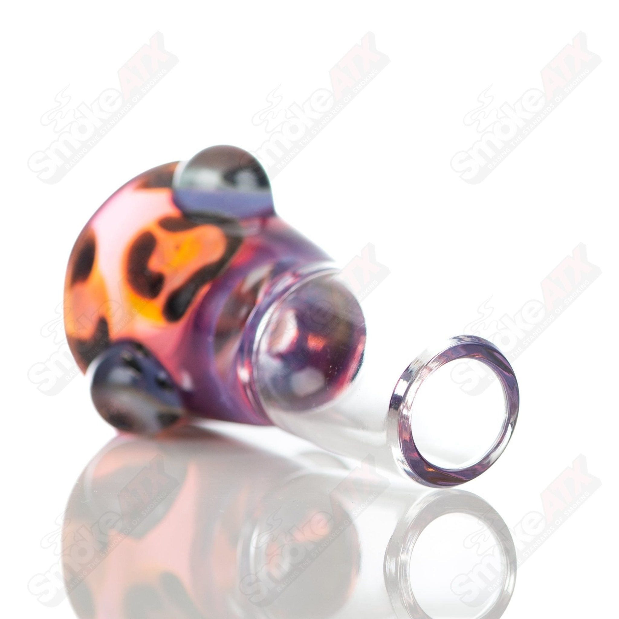Glass bowl with leopard print and dot design, 18mm martini bowl by Adventures In Glass Blowing, showcasing colorful glass art.
