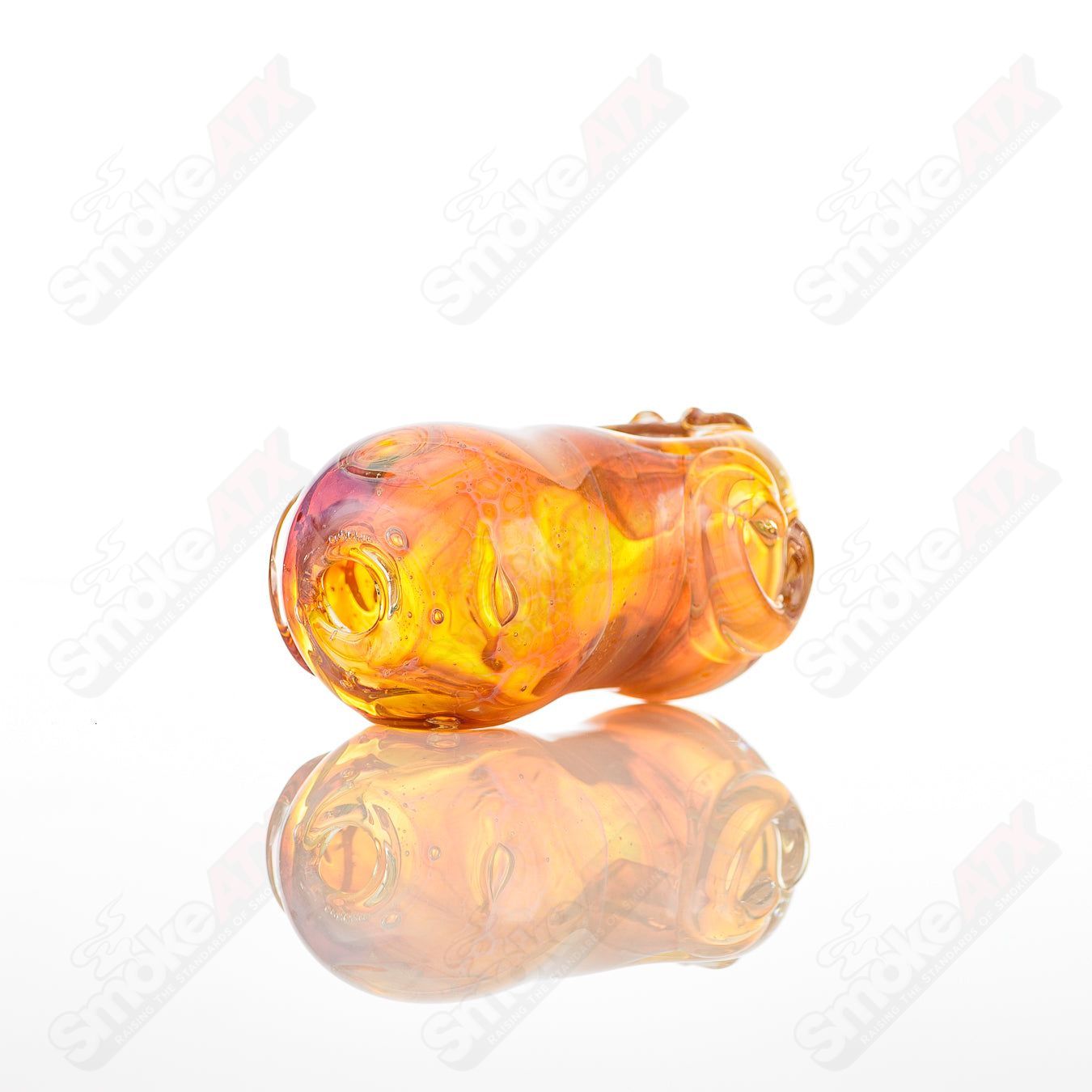 Glass pipe called the #5 Bean Spoon by Nobody, featuring a clear glass design with a bean-shaped bowl and smooth mouthpiece.