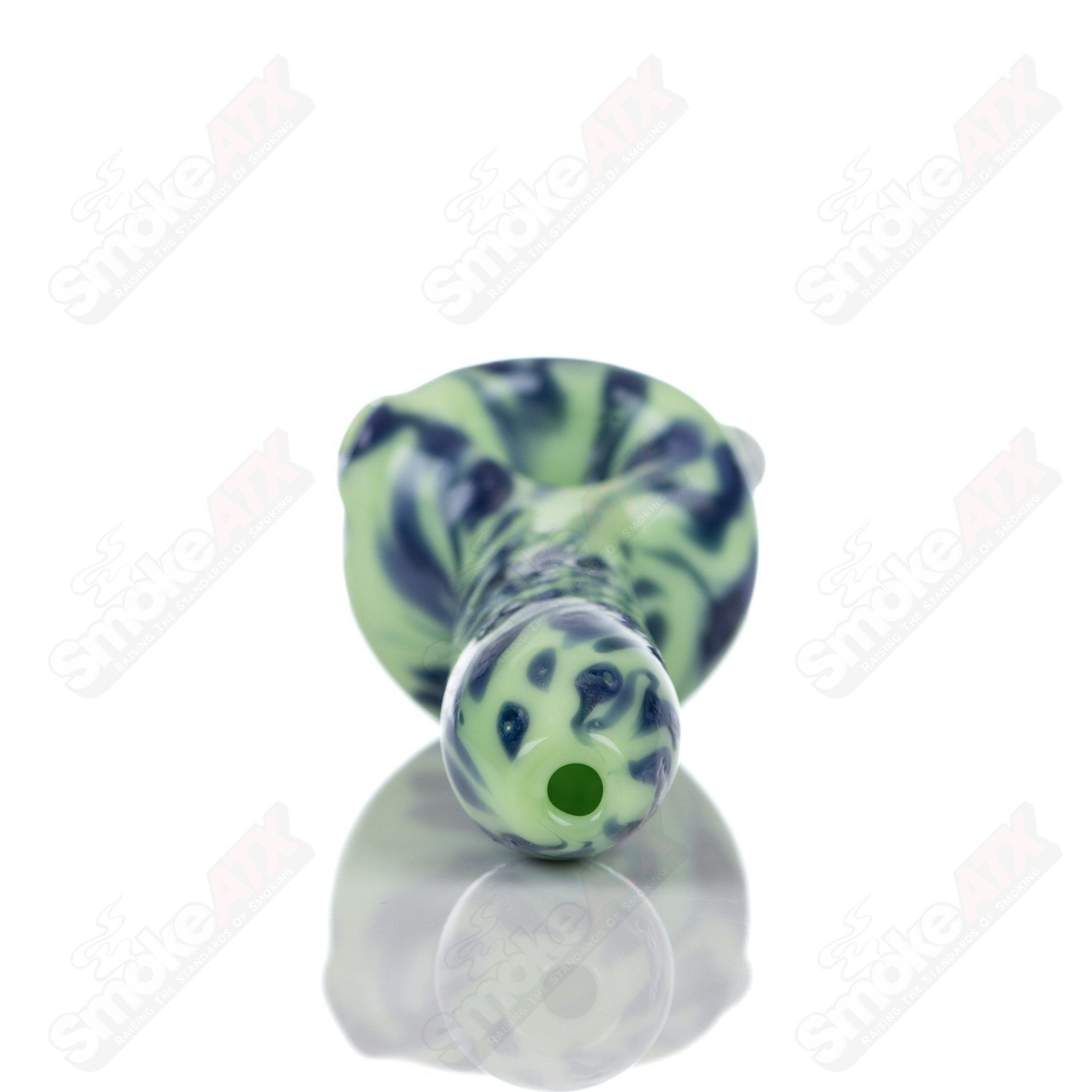 Colorful Kiwi splatter glass spoon pipe by Adventures In Glass Blowing, showcasing intricate glass blowing details.