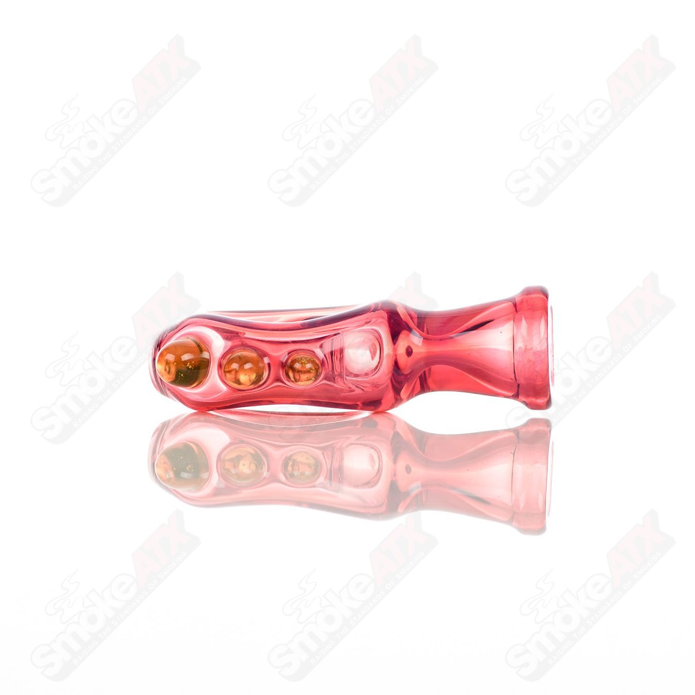 Large glass Donut Chillum by Baby Dabs, designed for baby dabs, featuring a colorful donut-shaped mouthpiece and clear glass body.