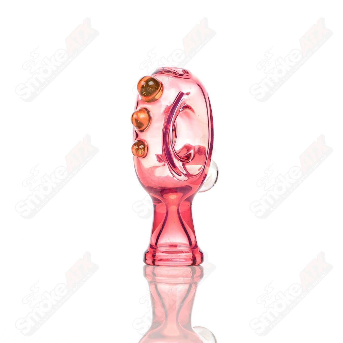 Large glass donut chillum by Baby Dabs, designed for baby dabs, featuring a colorful donut shape and compact glass construction.