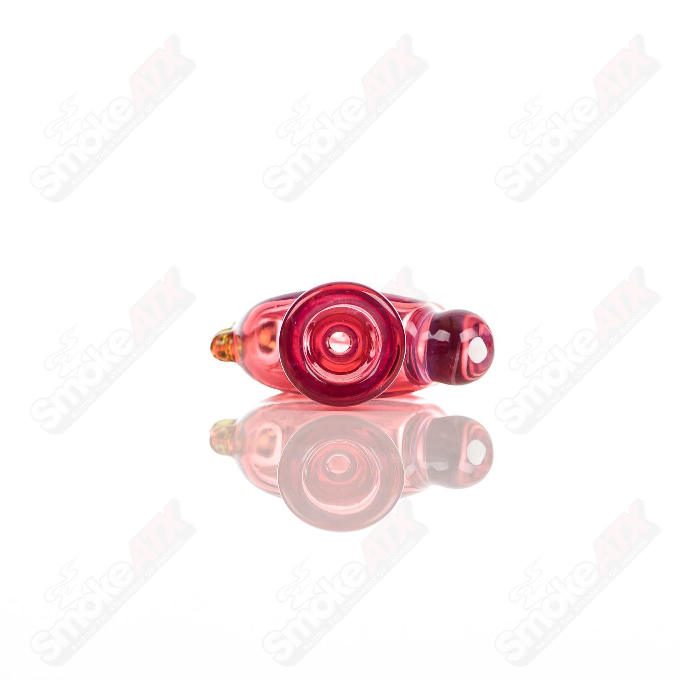 Large glass donut chillum by Baby Dabs, designed for baby dabs, featuring a colorful donut shape and smooth glass finish.