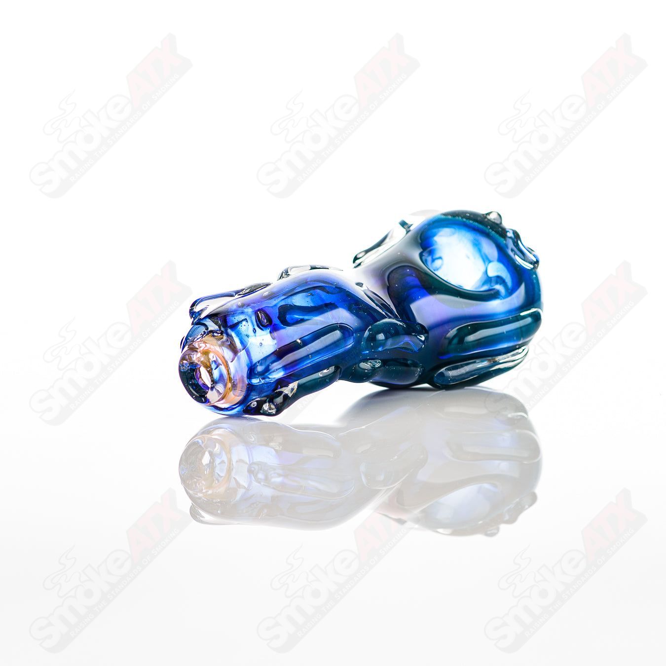 Glass pipe called #5 Spoon Glass by Nobody, showcasing clear glass with a smooth, rounded bowl and a straight stem design.