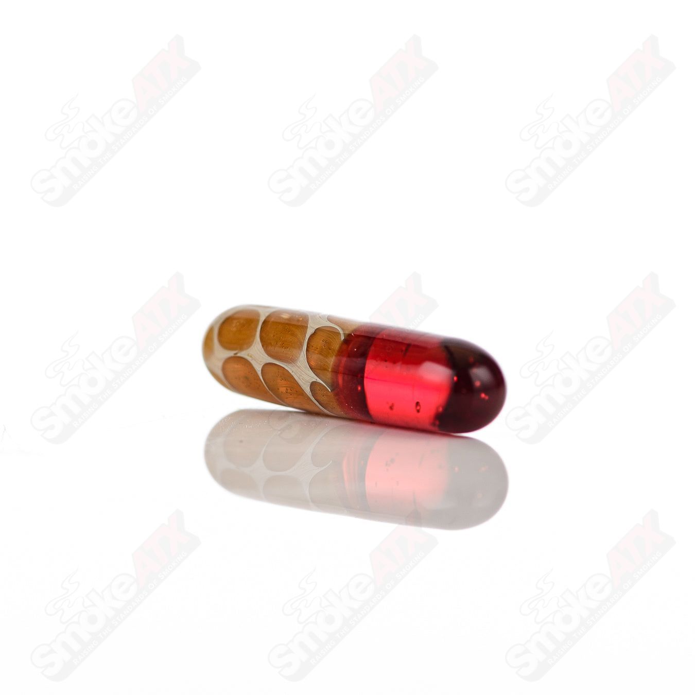 Robertson Glass 710 Products #5 Terp Pill, clear glass concentrate container with rounded shape and secure lid.