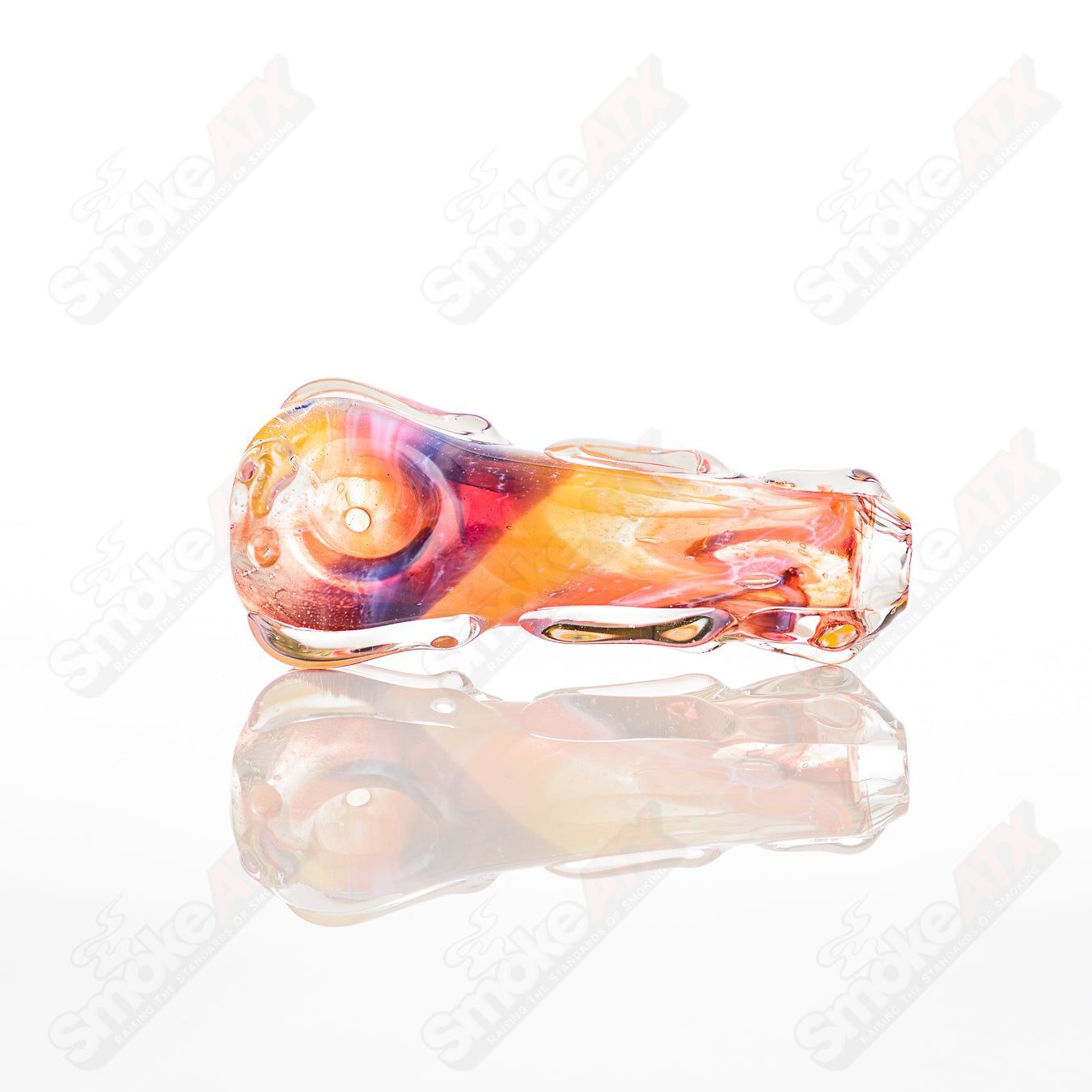 Spoon-shaped glass pipe by Nobody, featuring a clear glass design with a rounded bowl and slender stem for smoking.