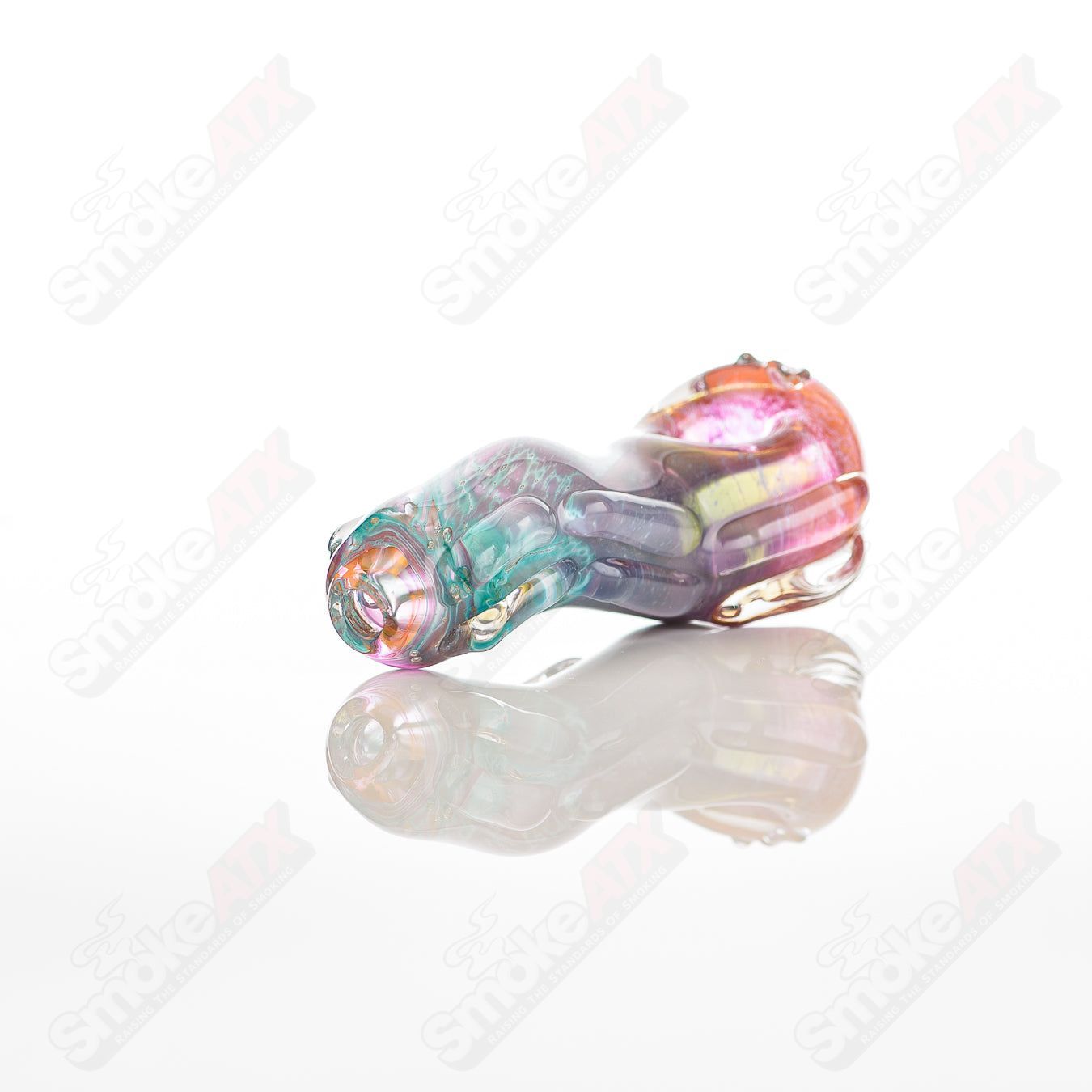Glass pipe called #55 Spoon Glass by Nobody, featuring clear glass with a smooth bowl and elongated stem for smoking.
