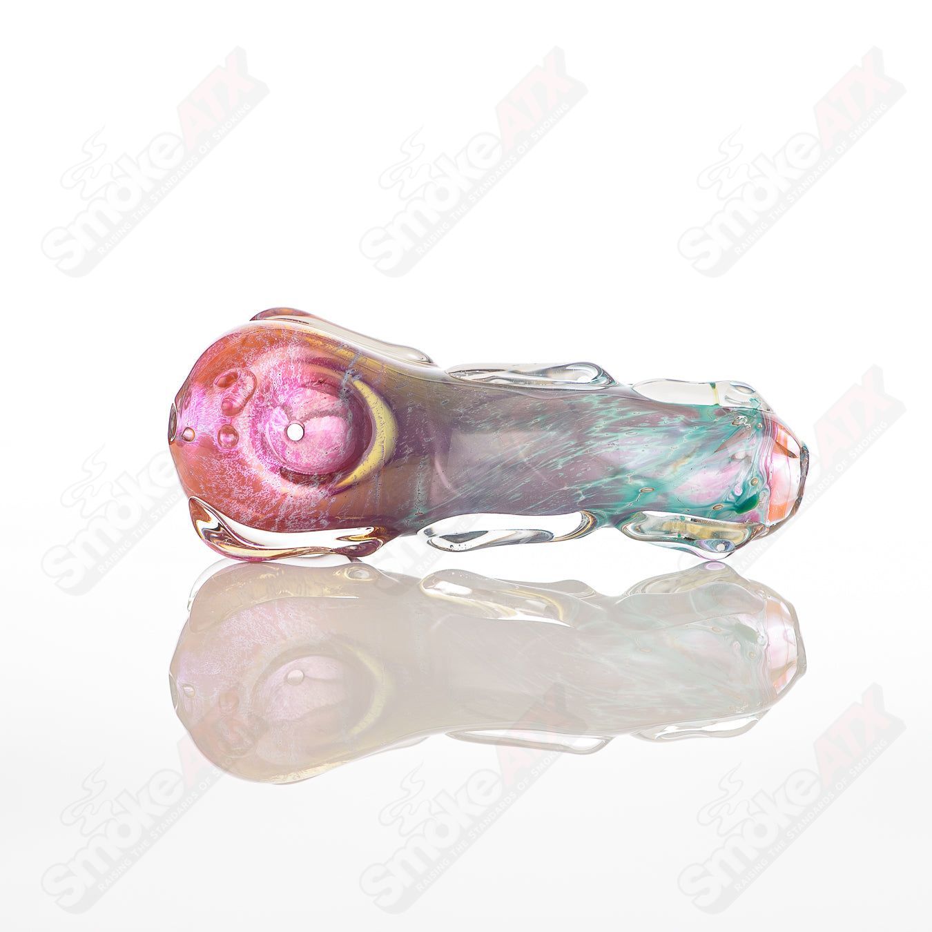 Glass pipe titled #55 Spoon Glass by Nobody, clear glass with a smooth bowl and rounded shape for smoking or display.