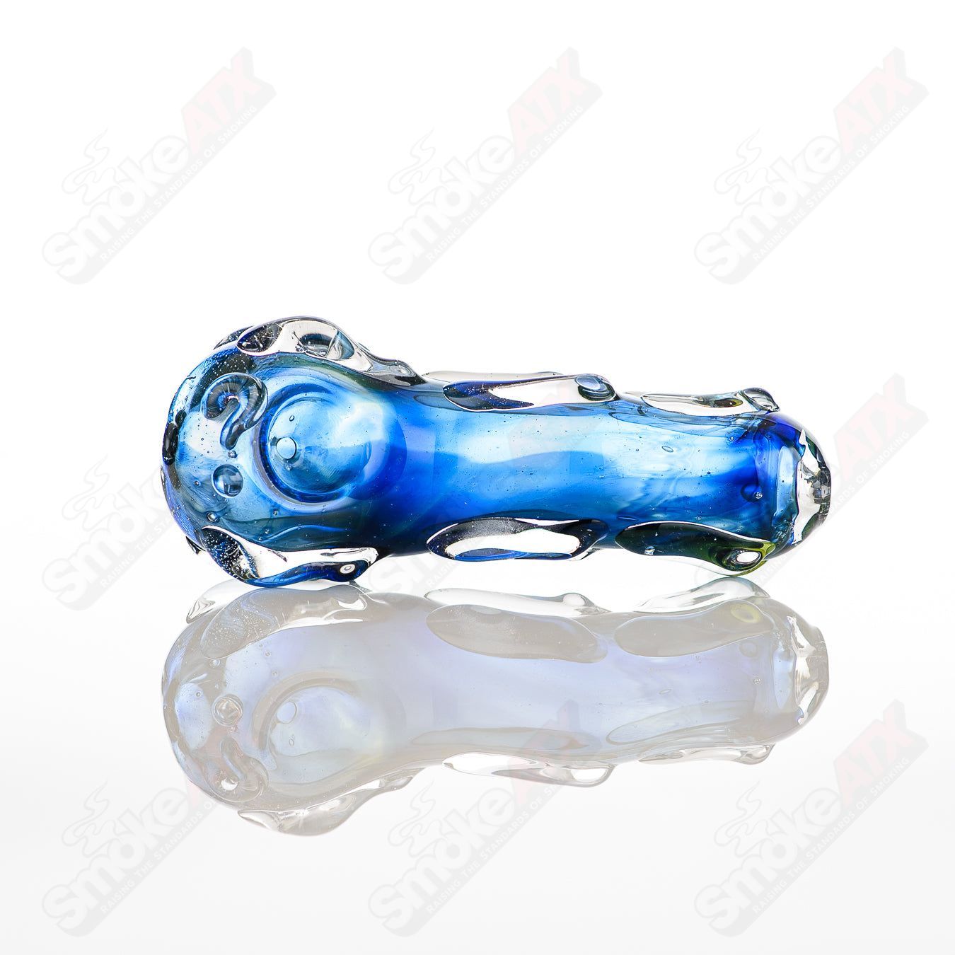 Glass pipe called Spoon Glass by Nobody, featuring a clear glass design with a rounded bowl and smooth stem for smoking.