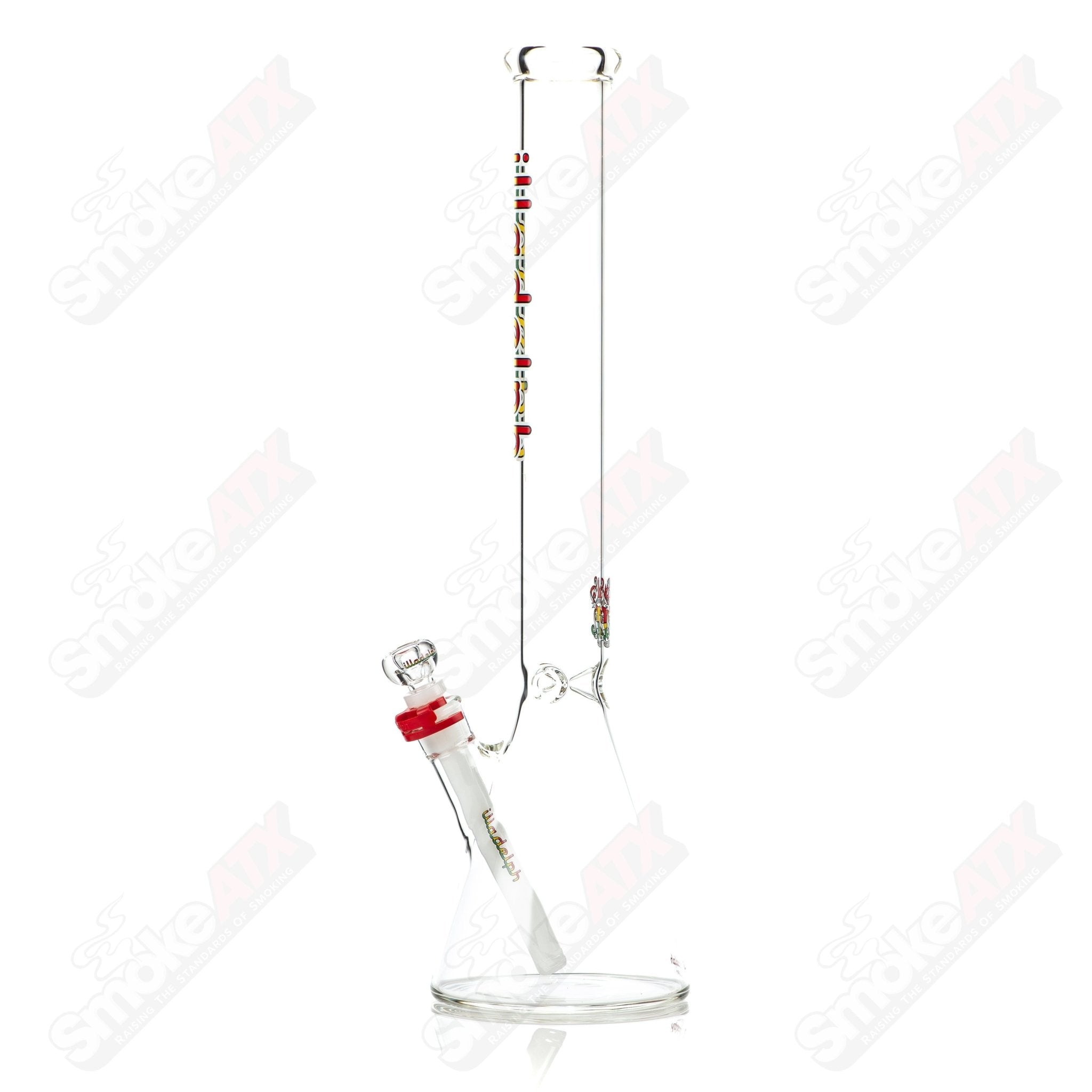 Rasta-colored 5mm glass medium beaker by Illadelph, featuring vibrant design and sturdy construction for smoking or display.