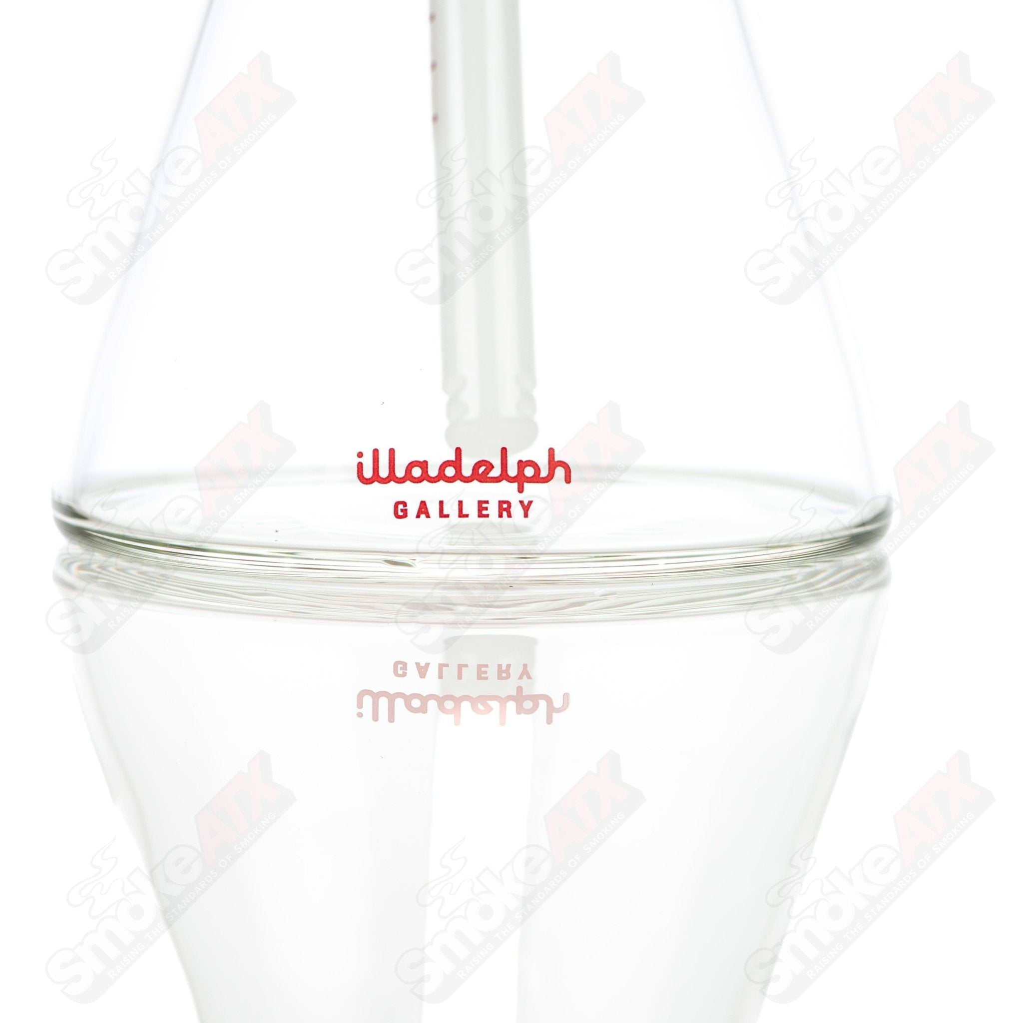 Illadelph 5mm Rasta medium beaker glass water pipe with colorful Rasta design and sturdy construction.