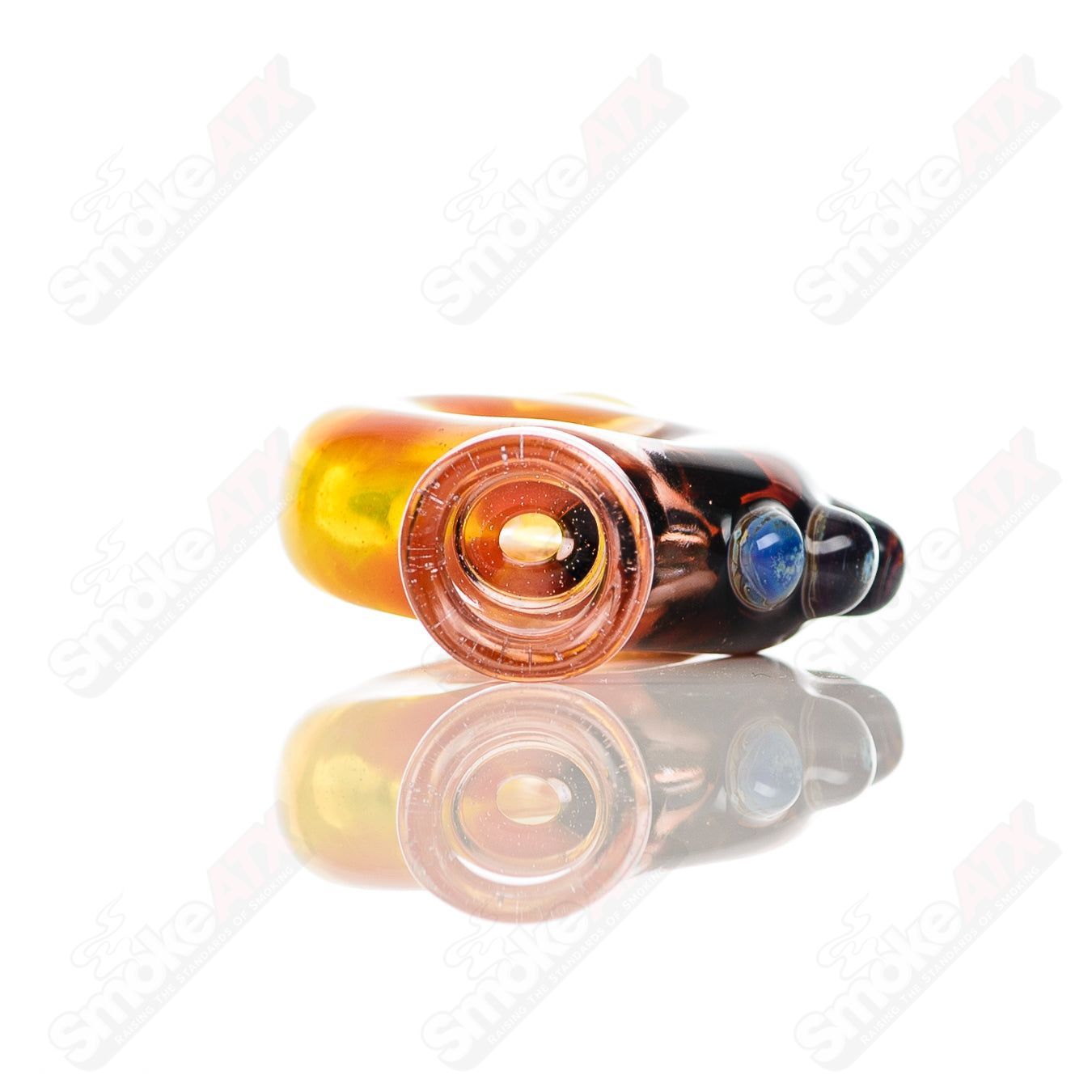 Large glass donut chillum by Baby Dabs, designed for baby dabs, featuring a colorful donut shape and sturdy glass construction.