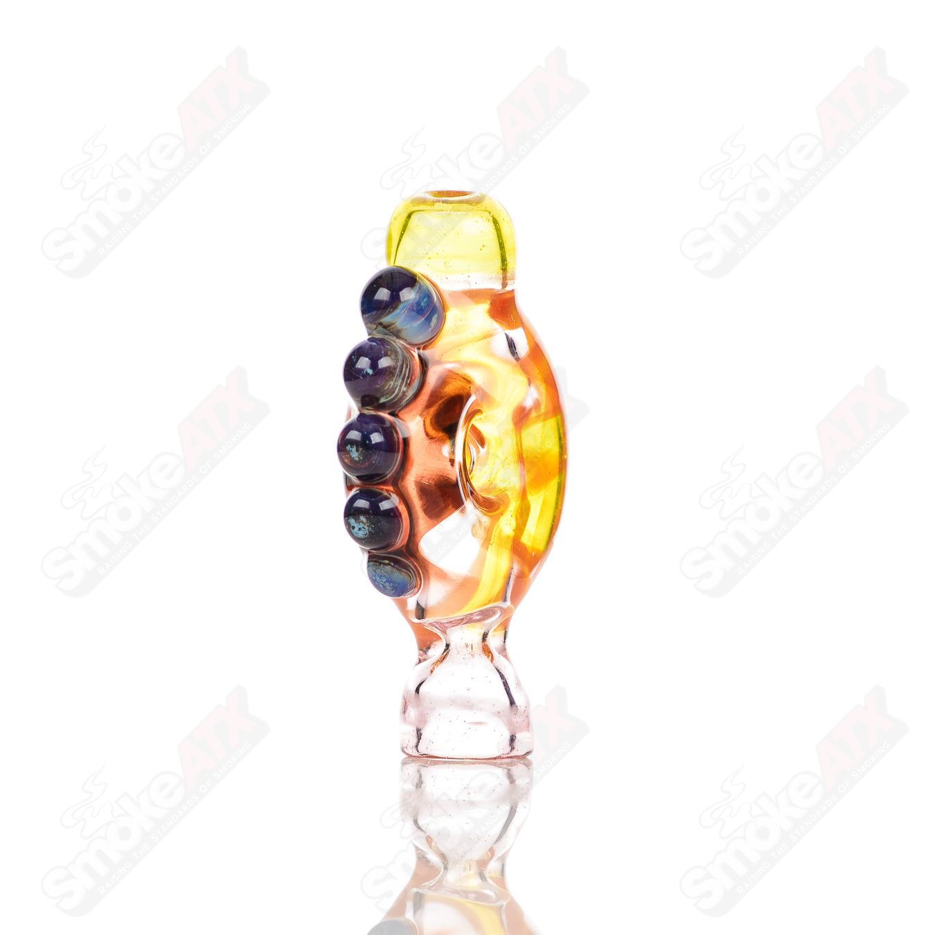 Large glass donut chillum by Baby Dabs, designed for baby dabs, featuring a colorful donut shape and smooth glass construction.