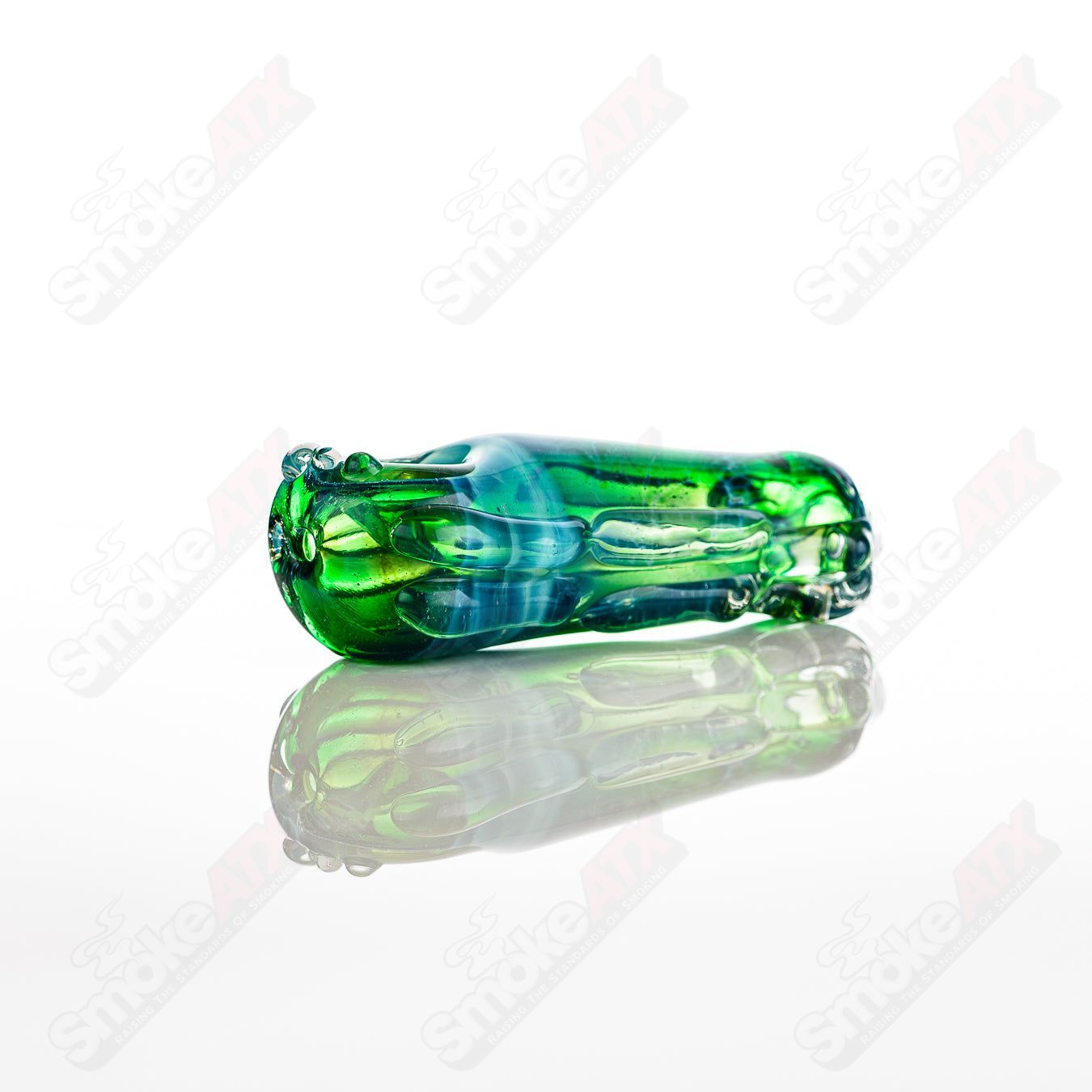 Clear glass spoon pipe by Nobody, featuring a smooth, rounded bowl and a durable glass design for easy handling.