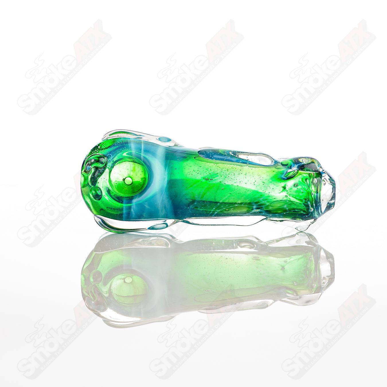 Clear glass spoon pipe by Nobody, featuring a smooth, rounded bowl and long stem for easy handling and use.