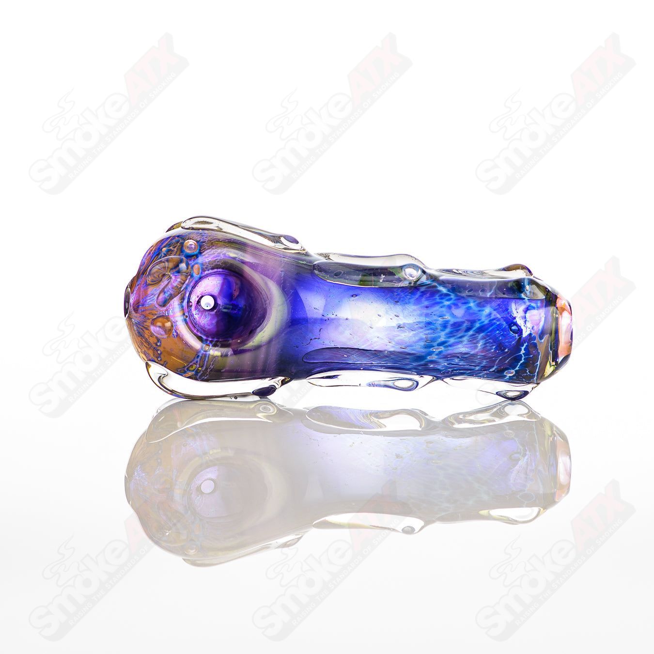 Glass pipe with a spoon-shaped bowl, clear glass design from Nobody's 60 Spoon Glass collection.