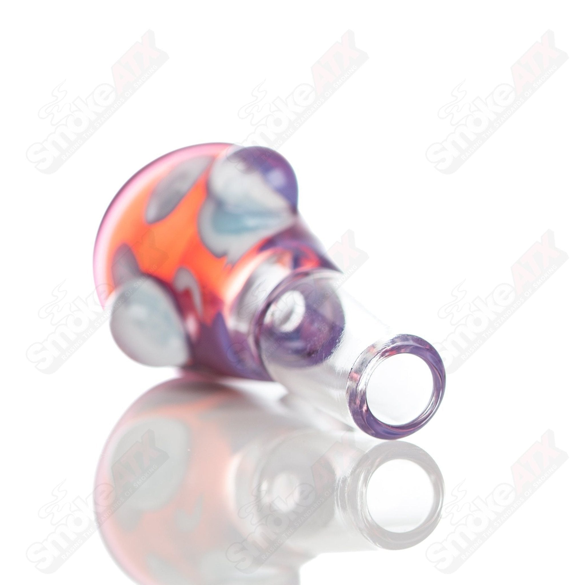 Leopard print Martini bowl with dot accents, crafted by Adventures In Glass Blowing, featuring intricate glass design and vibrant pattern.