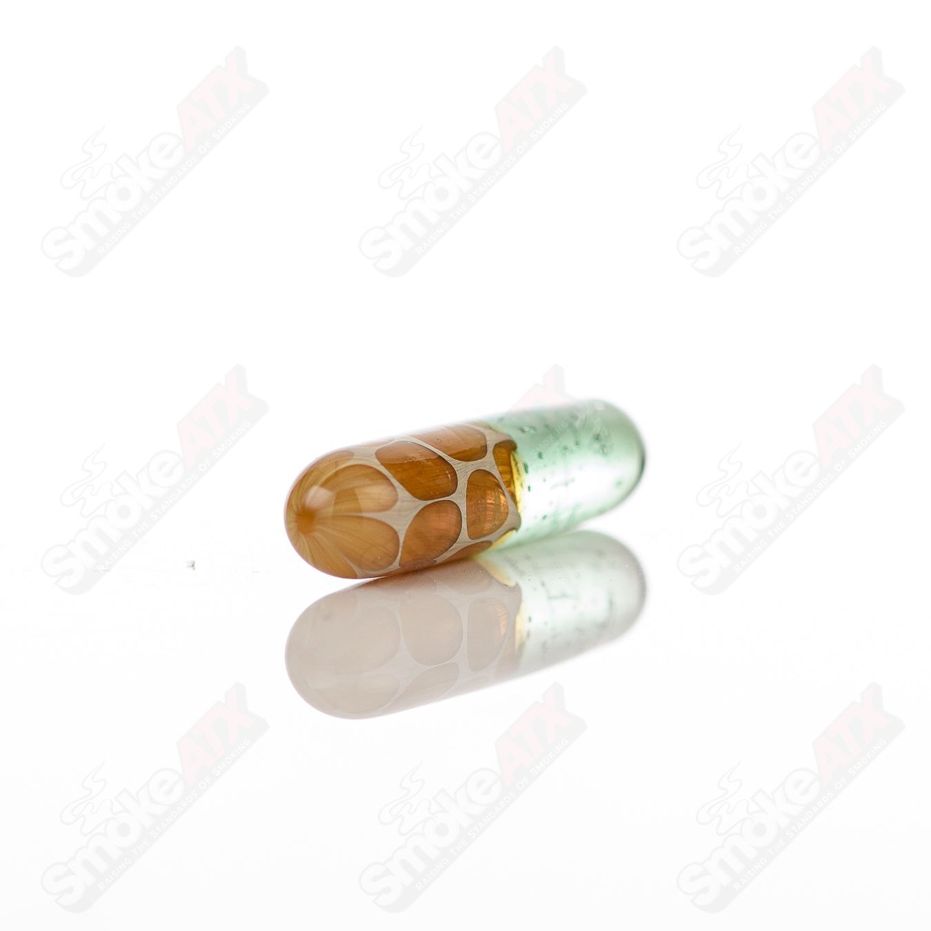 710 Products Robertson Glass 7-terp Pill ceramic dab dish with colorful design and textured surface for concentrates.