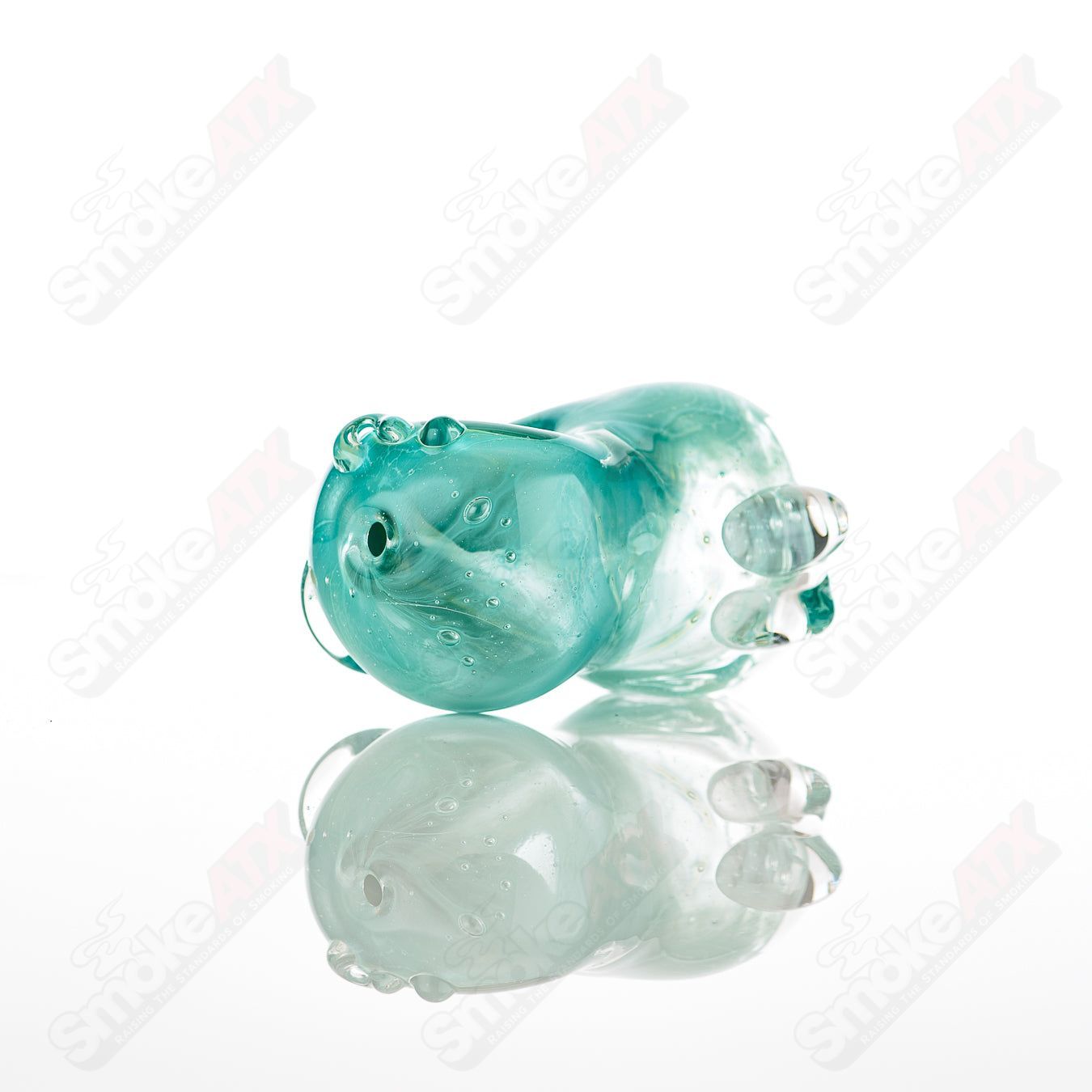 Glass pipe called #8 Bean Spoon by Nobody, featuring a clear glass design with a bean-shaped bowl and a smooth mouthpiece.