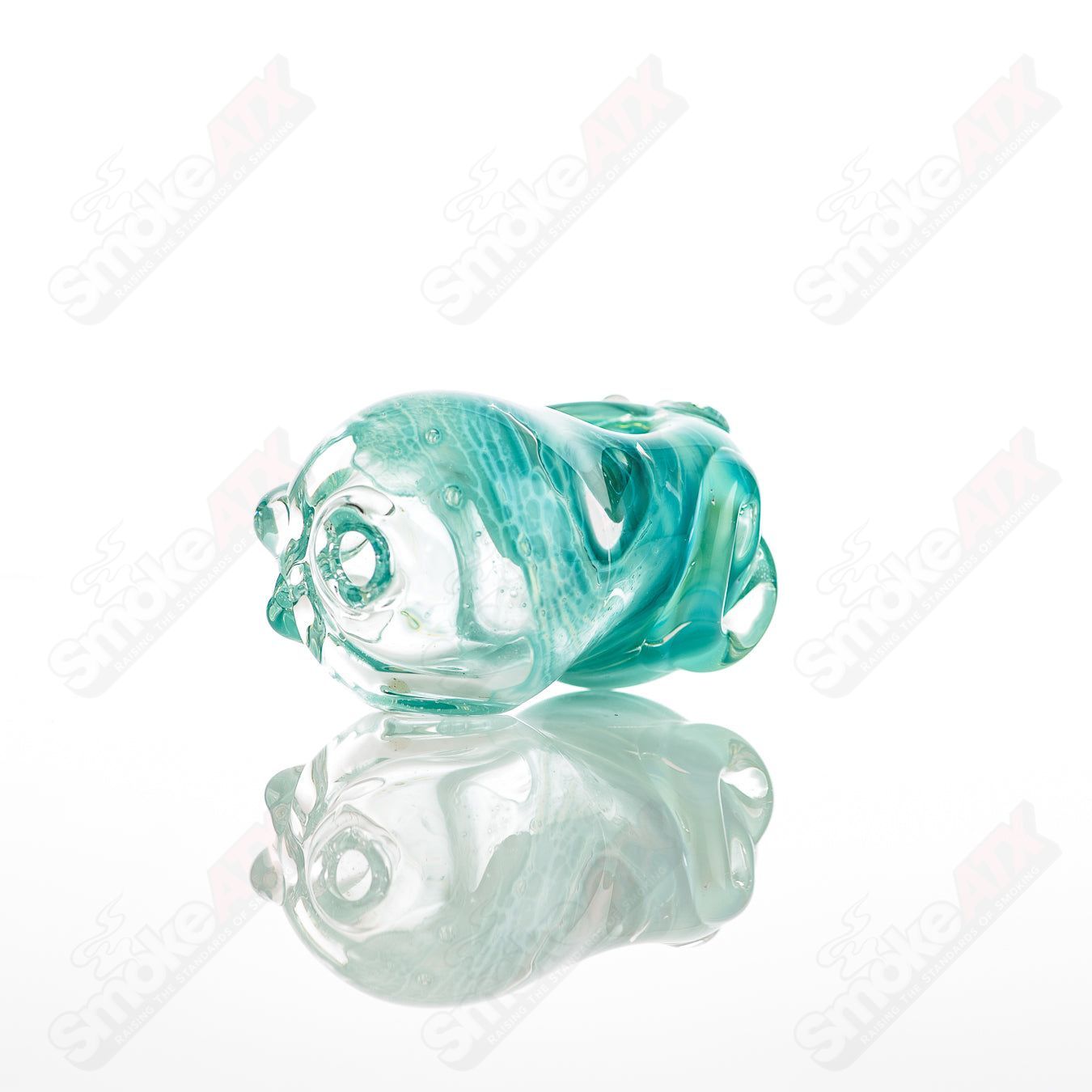 Glass pipe called #8 Bean Spoon by Nobody, featuring a clear glass design with a bean-shaped bowl and smooth mouthpiece.