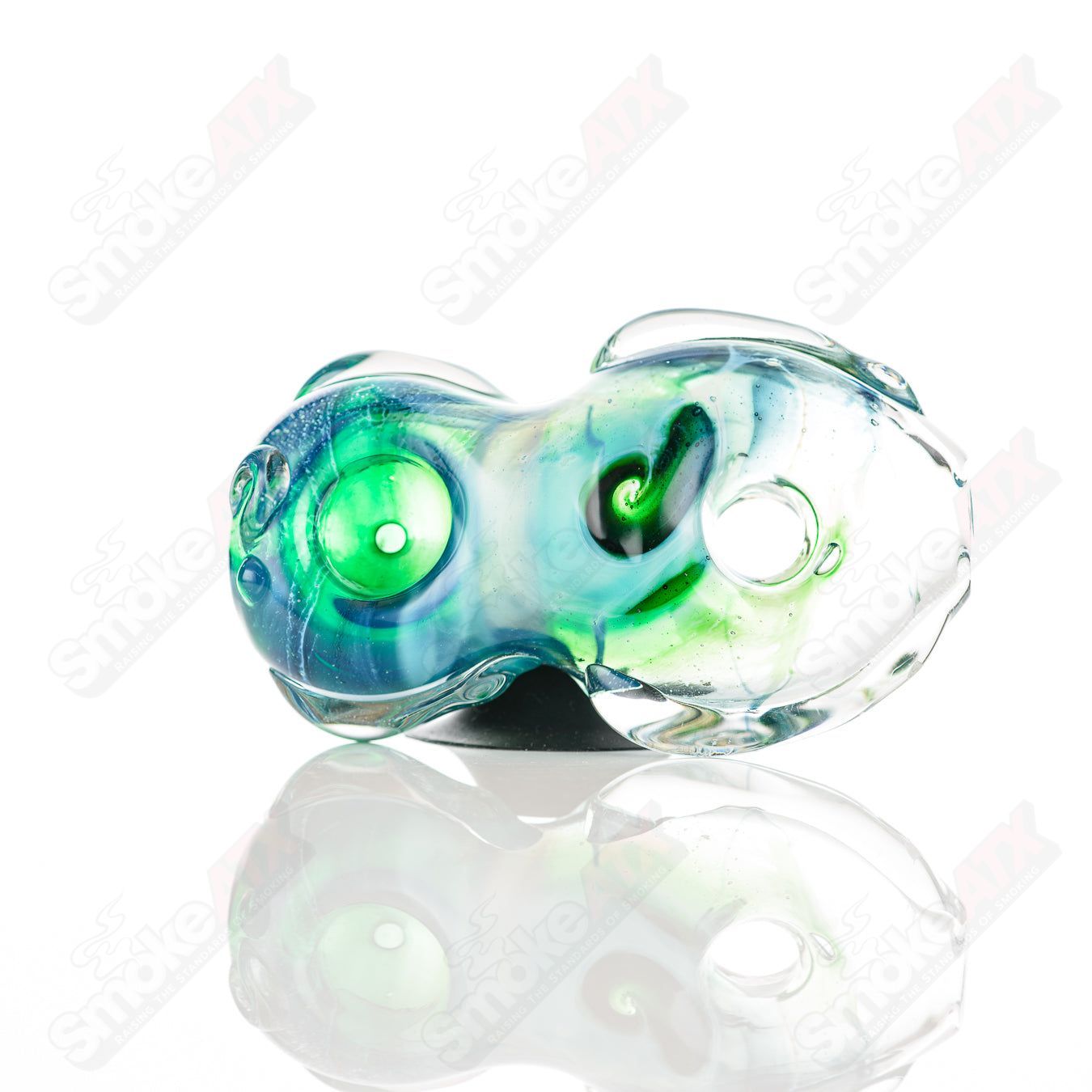 Glass pipe with an 8-donut Chillum design by Nobody, featuring colorful glass detailing and a smooth, cylindrical shape.