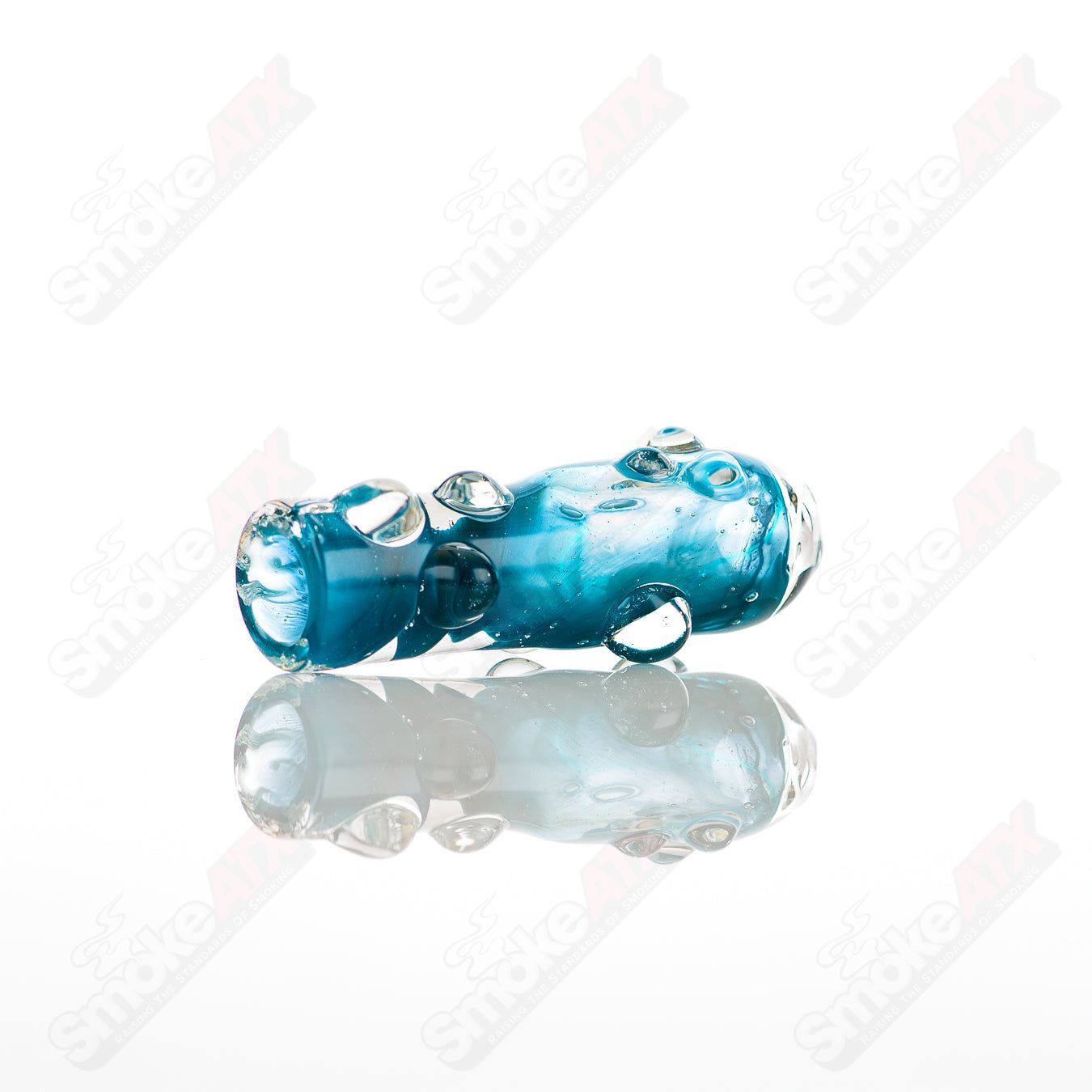 Large #8 glass chillum by Nobody showing a clear, cylindrical glass pipe with a smooth finish and rounded mouthpiece.