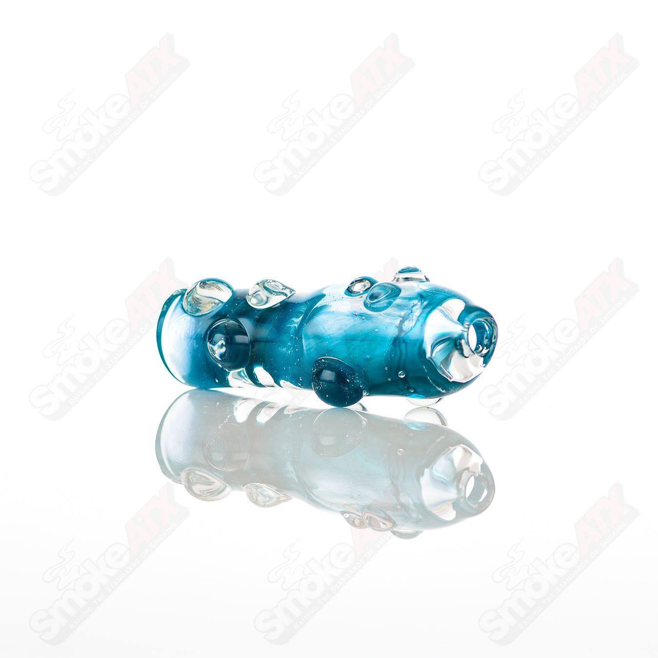 Large #8 glass chillum by Nobody, clear transparent glass pipe with smooth finish and compact design for smoking.